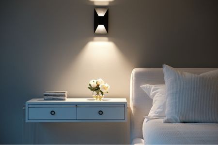 Night stands with spot lights are definitely the vibe. With this modern luxury bedroom, a night stand is a must and so is the light above! #luxuryliving #nightstand 

#LTKFind #LTKhome #LTKfamily