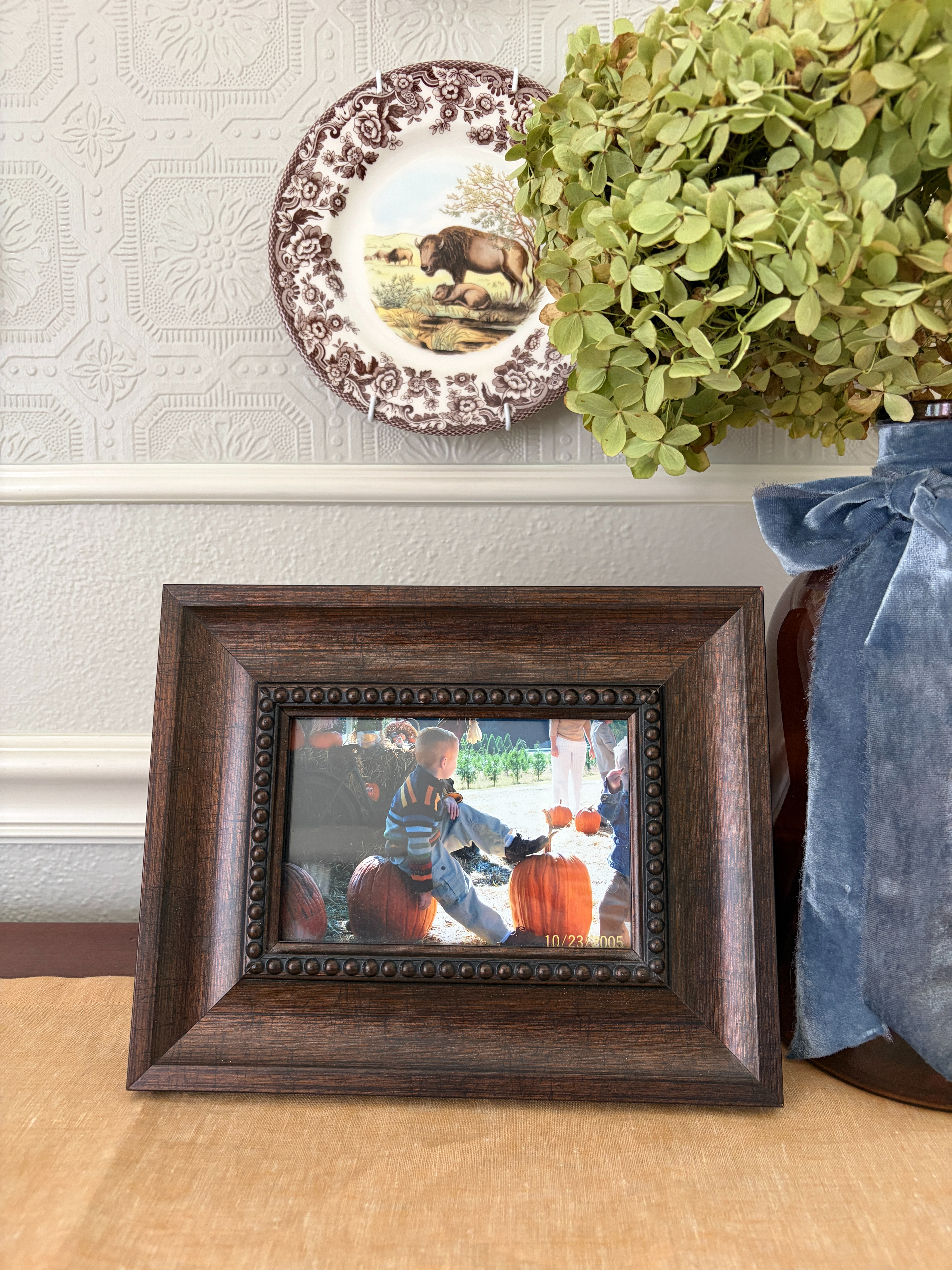 With a few thoughtful swaps, your everyday decor becomes beautiful home decor for fall.

Beautiful Spode plates + dried hydrangeas in a brown glass vase + family photos from the pumpkin patch

Follow @belleantiquarian for more lifestyle inspiration. 

 