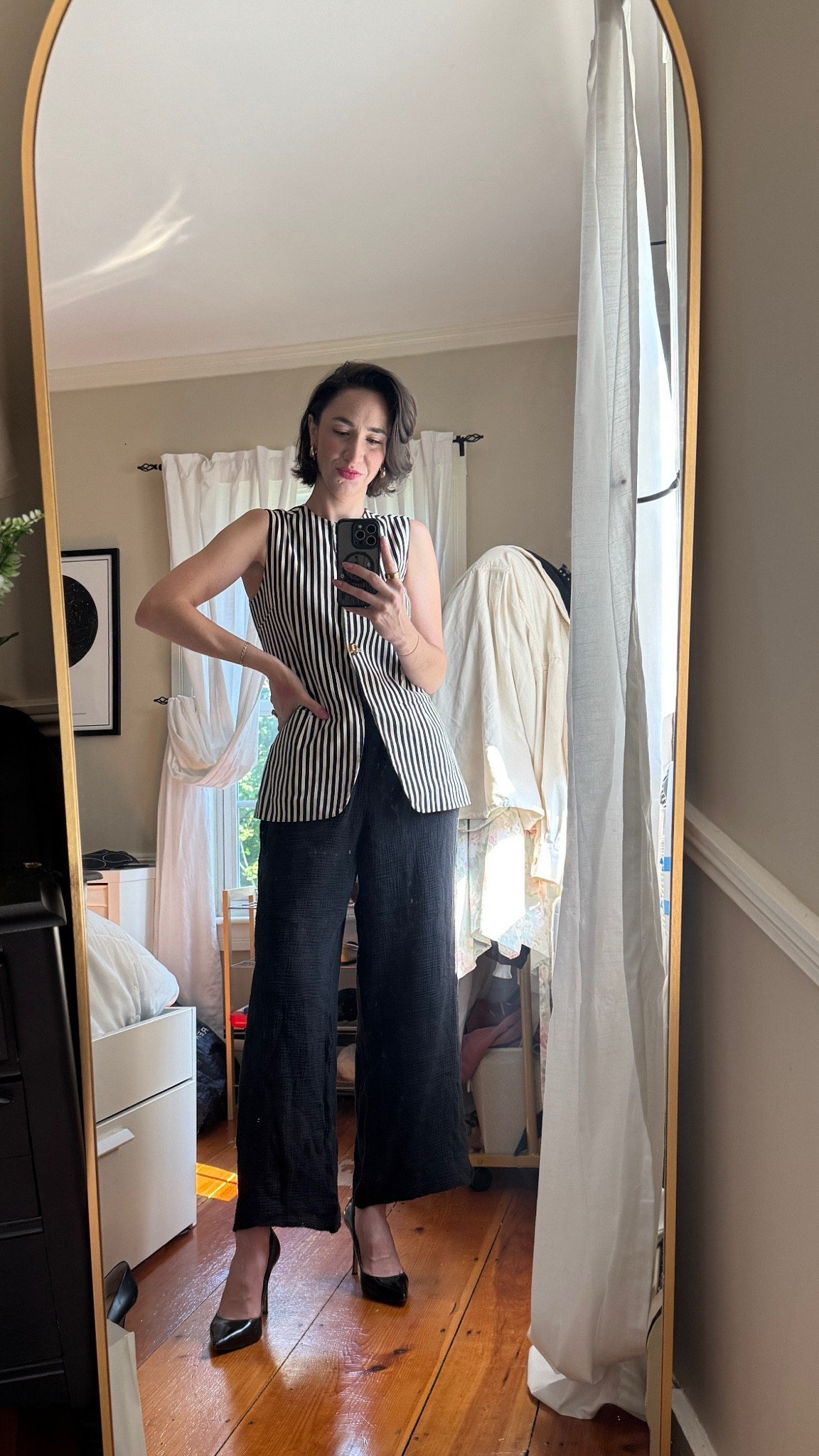 POV: The heels made it through the mirror selfie… then immediately got swapped for slippers. 🤍😂

This striped linen vest has quickly become one of my favorite Rent the Runway finds. It gives such an elevated, tailored look without feeling overly formal, and paired with relaxed linen pants it feels polished enough for meetings but comfortable enough for a full day at my desk.

(Just pretend you don’t know what’s happening below the desk. 🩴)

Everything linked!

French style, work outfit, office outfit, creative office style, linen vest, striped vest, Rent the Runway, linen pants, black linen pants, summer workwear, business casual, elevated basics, capsule wardrobe, modern classic style

#LTKWorkwear #LTKStyle #LTKSummer #OfficeStyle #FrenchStyle #BusinessCasual #RentTheRunway #CapsuleWardrobe #LinenStyle #WorkOOTD

#LTKdayinmylife #LTKgrwm #LTKootd