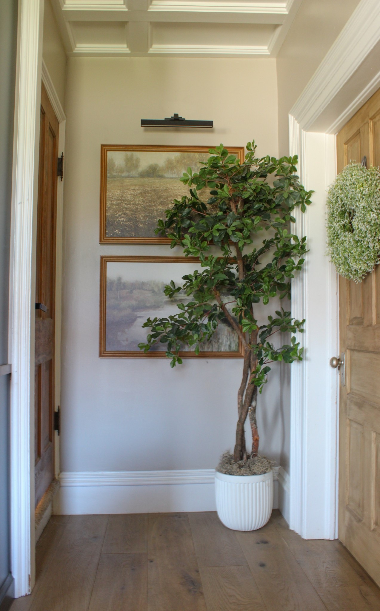 Hallway Styling & Decor.

This neutral corner in my living room got a little extra attention this spring.

Simple styling featuring classic canvas framed landscape artwork from collection prints. (Custom graming from Michael’s Craft store) 

Accompanied by a minimal artificial black olive tree in a fluted neutral planter and topped off with modern, black picture light.

Everything feels a little more organic & lived in now.

The mix of warm wood tones, vintage-inspired frames, and soft greenery creates the perfect cozy cottage + modern farmhouse aesthetic.

#LTKHome