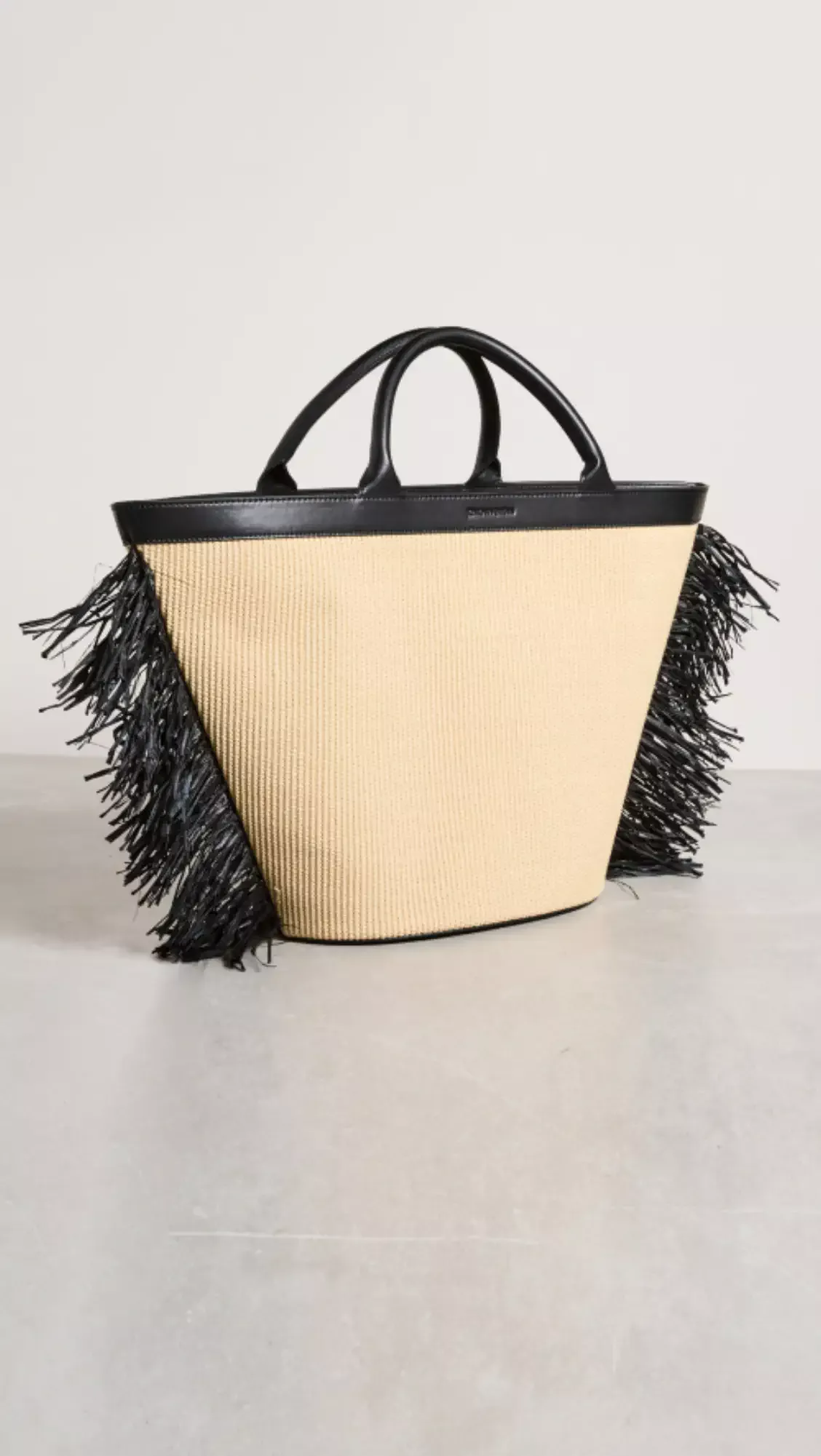 Tropicalia micro leather-trimmed fringed faux raffia tote