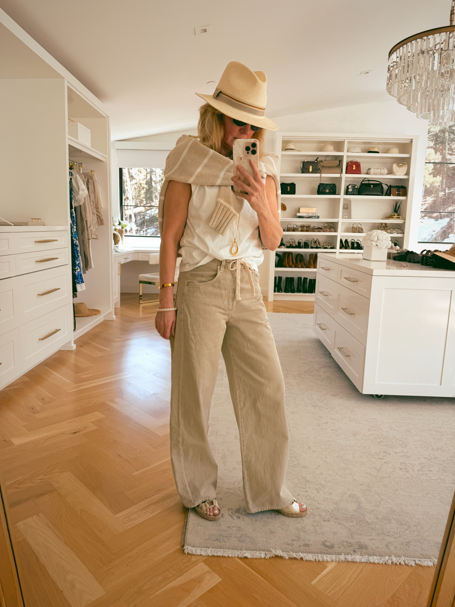 Your spring wardrobe called. It wants this neutral outfit.

Citizens of Humanity drawstring jeans in the most perfect stone/khaki tone — the “it” denim color of the season. Slightly barrel shaped, relaxed and so easy to wear. Topped with a structured shoulder tee, espadrille wedges and a packable rag & bone straw fedora. This whole look just works. 

The can’t miss cotton striped sweater is the one you’ll reach for again and again. One of my faves! 

Tap images below to shop! 

#LTKOver40 #LTKootd #LTKSeasonal