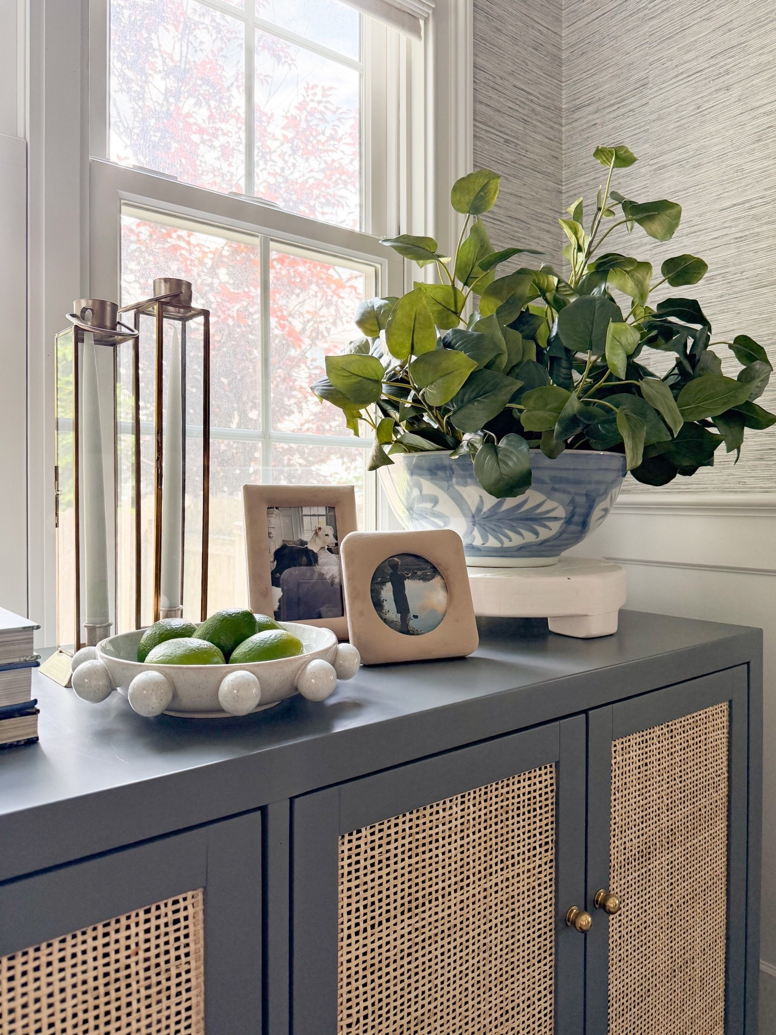 Easy, breezy Saturday morning ☀️

I often get questions about styling different corners of a home so here’s a peek at how I’ve accessorized our dining room console for summer. A big, beautiful bowl filled with greenery (you can use bowls instead of vases!), taper candles, a pair of photo frames, and a cool dish filled with limes… 

Dining room, chandelier, lighting, dining room inspo, dining room decor, console table decor, Serena & Lily, grasscloth wallpaper, girlonthehudson, neutral home, modern coastal, minted art, cozy home

#LTKSaleAlert #LTKHome #LTKSeasonal
