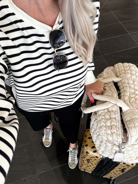 Travel outfit, Spanx airessentials, striped pullover, black scuba knit cropped pants, Walmart fashion, luggage, weekender bag 

#LTKTravel #LTKStyleTip #LTKFindsUnder50