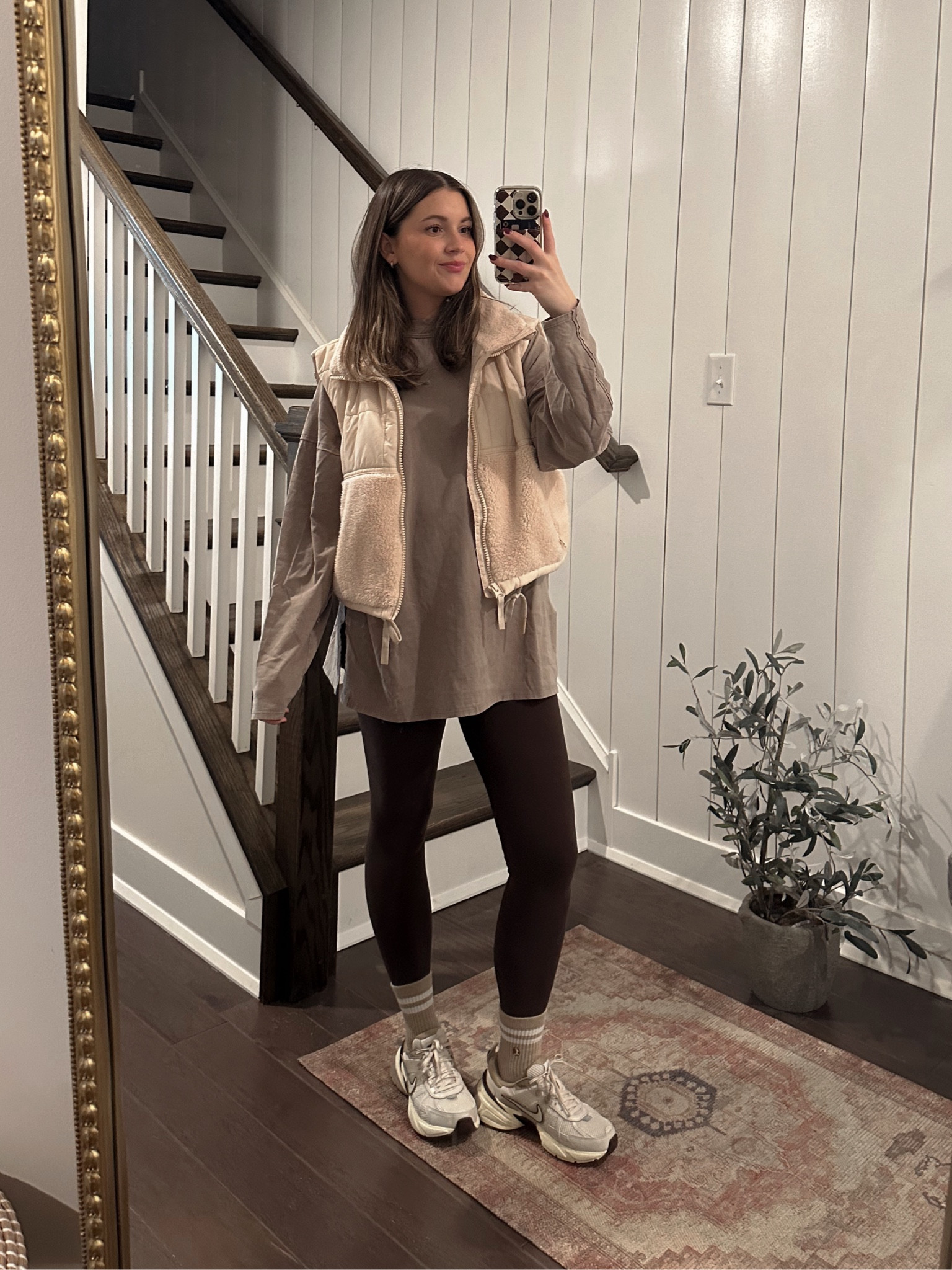 Wearing a medium in the tee and vest! Size 4 in Lulu aligns! Color is “espresso"