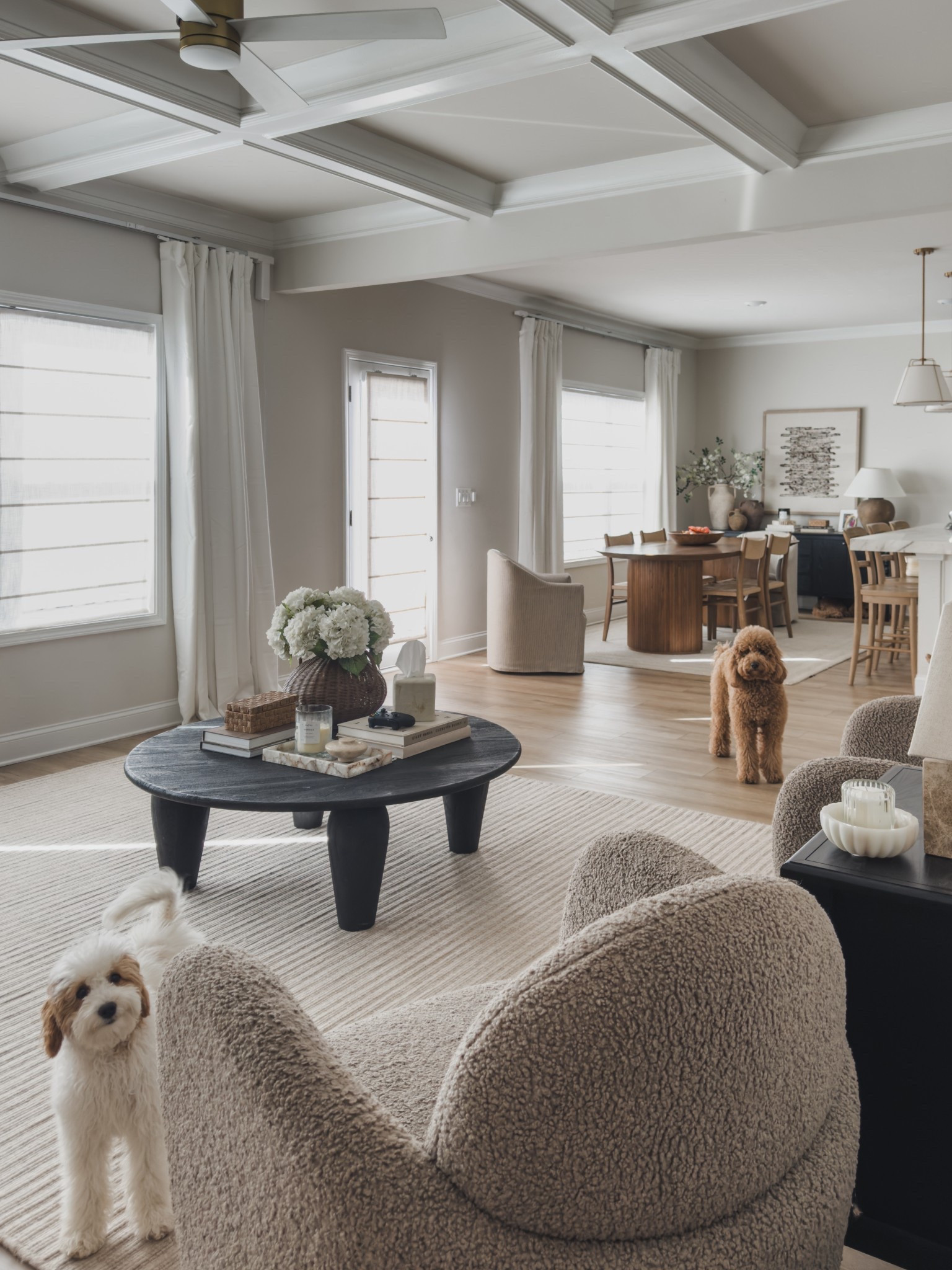 Sharing my open concept living area furniture faves… if @castlery would send the rest of my order so this space can actually be finished.

My living room rug is one of my favorite pieces — a beautiful wool with the most subtle texture and pattern that adds warmth without overwhelming the space. Paired with an oversized coffee table that really anchors the room and makes it feel collected and functional for everyday life.

In the dining area, I’ve had this oval table for years and it still holds up so well — it seats up to 8 and works perfectly for both daily life and hosting. The slipcovered end chairs are a must in our house — easy to clean, super comfortable, and they roll (which makes a big difference). And the wood side chairs are the prettiest tone, adding just the right amount of texture while still being really comfortable.

Just waiting on the rest of my furniture to pull it all together.

#LTKSeasonal #LTKSaleAlert #LTKHome