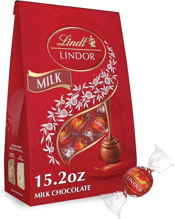 Lindt LINDOR Milk Chocolate Candy Truffles, Milk Chocolate with Melting Truffle Center, 15.2 oz. ... | Amazon (US)