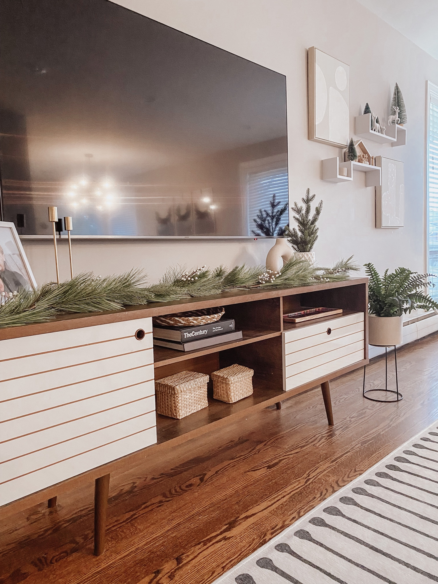 Living Room Christmas Decor
Minimalistic | living room | tv stand | garland | rug 

#LTKSeasonal #LTKHoliday #LTKhome