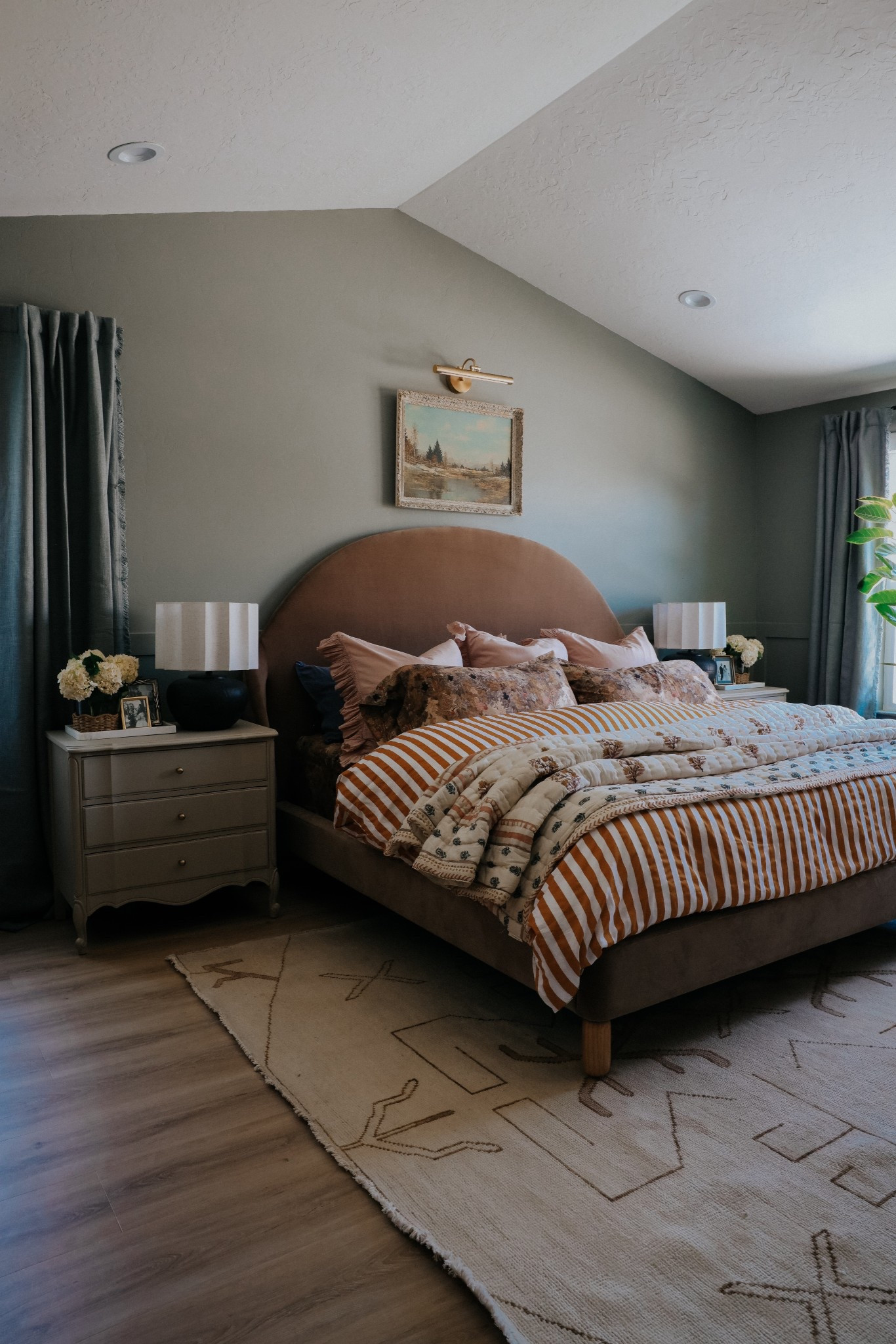 Nightstands & art were thrifted 
Wall color was a color match to Pigeon from Farrow & Ball