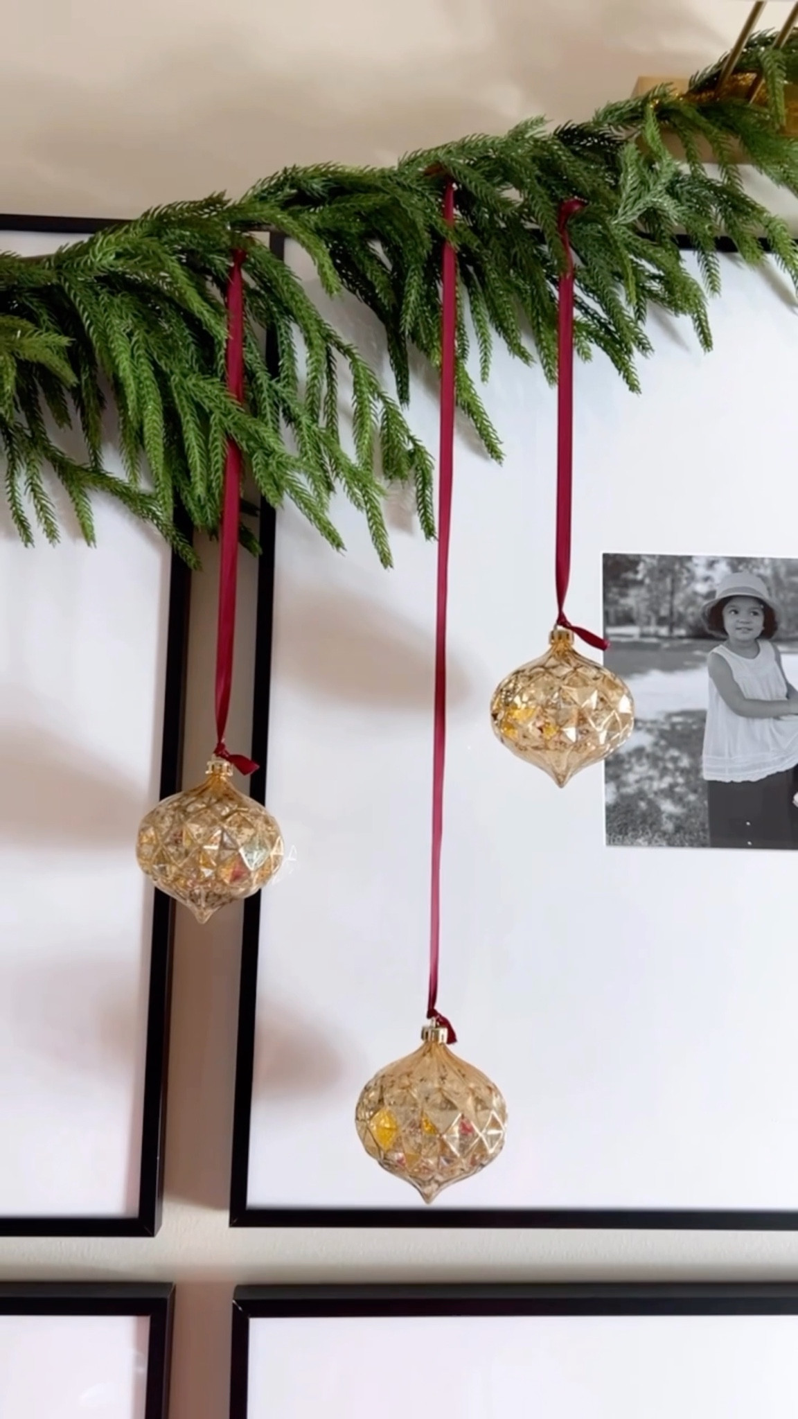 GALLERY WALL CHRISTMAS DECOR
#christmas2025 #christmasgarland #gallerywall #ornaments #burgundyribbon #amazonfind #amazonchristmas 

#LTKHoliday #LTKFindsUnder50 #LTKHome