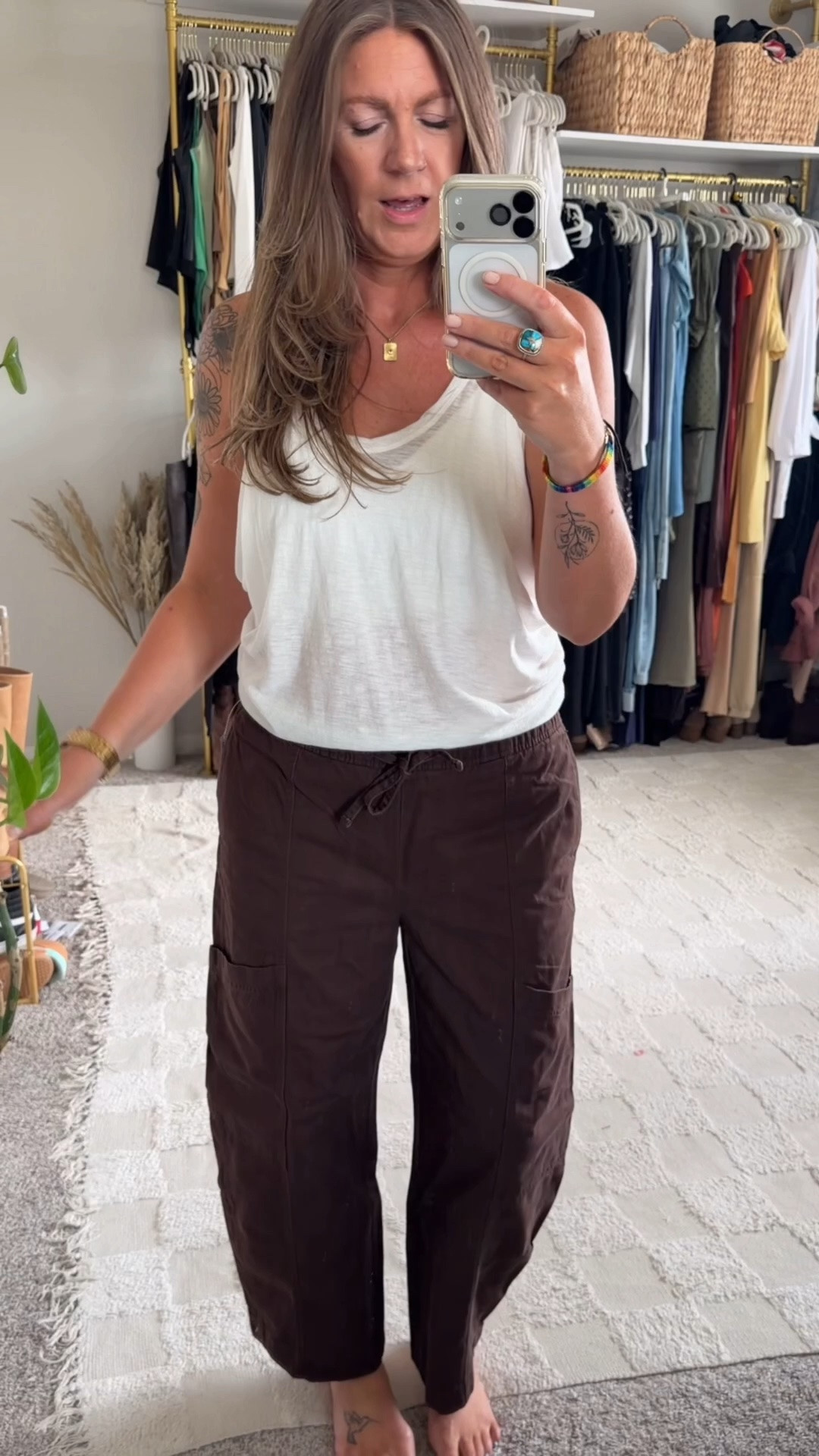 Large tank, medium tall pants (also saved 🇨🇦 links)

#LTKTall #LTKOver40
