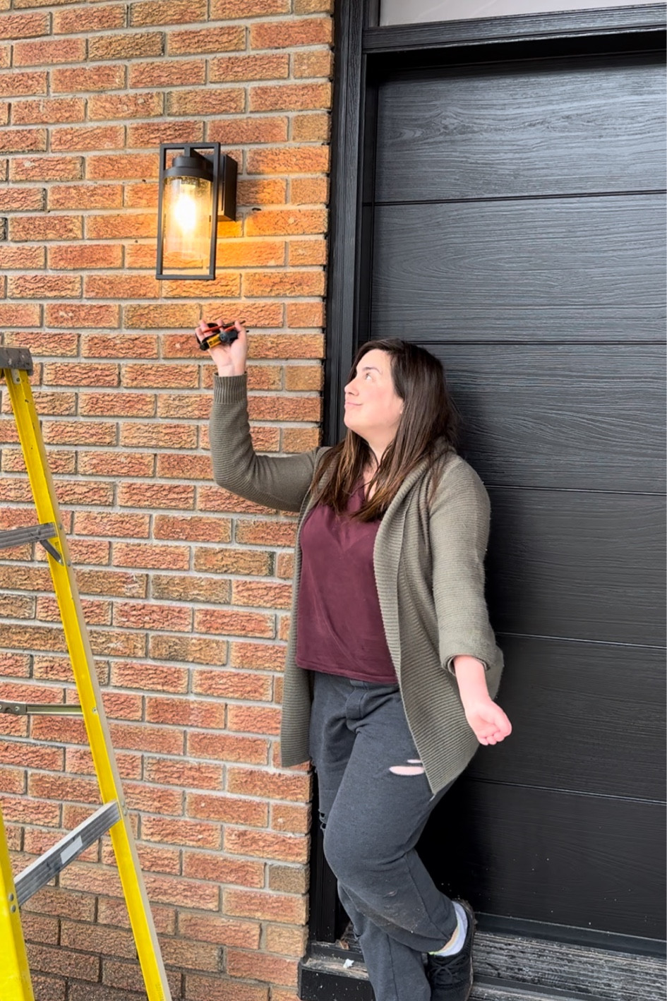 A porch light that's also a receptacle? Sign me up again and again! Perfect for hanging up Christmas lights and decorations! 

#LTKHoliday #LTKFindsUnder100 #LTKHome