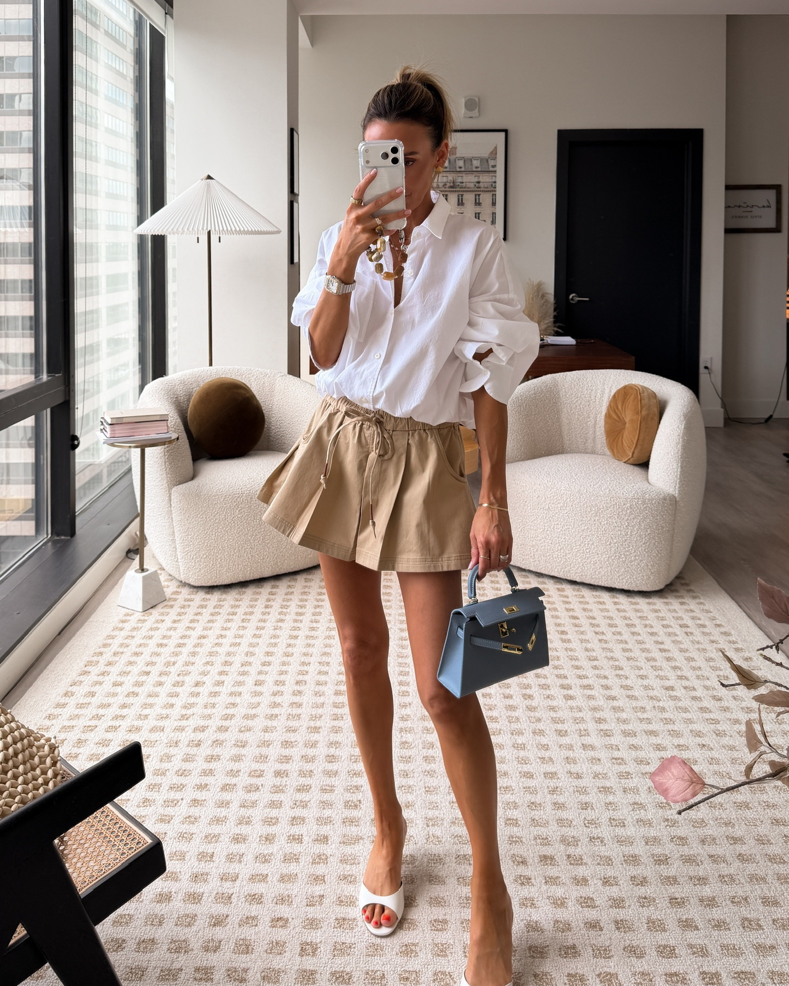 This pleated skort is giving all the girly vibes paired with this oversized button down that comes with an elastic to give a bubble effect — size s. On sale with code KARINA20

#LTKootd #LTKSaleAlert #LTKSeasonal