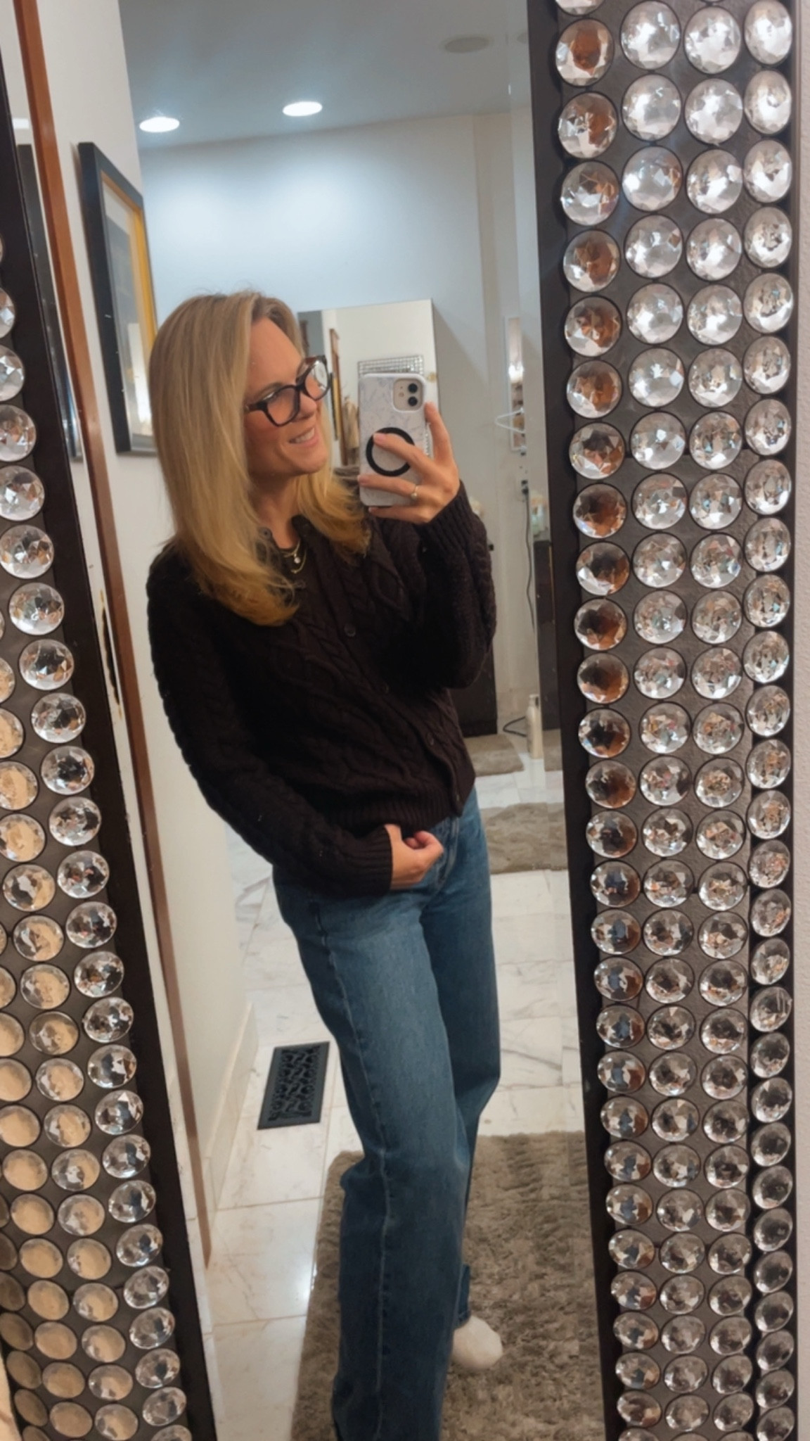 Another Aritzia entire look I love this cardigan. It’s like the Marino one. It is so soft and comfortable and it’s super thick so if you are anywhere where it’s cold and chill this is a great piece to have actually paired. It would be Aritzia long sleeve T-shirt underneath because it’s just so incredibly comfortable these are the new jeans I got from Aritzia the other day and I’m absolutely in love with them. They’re the Farah and then the Aritzia socks to complete the outfit. Probably gonna throw on my New cowboy boots with us and a Dior bag.

#LTKmorningroutine #LTKHoliday #LTKgrwm