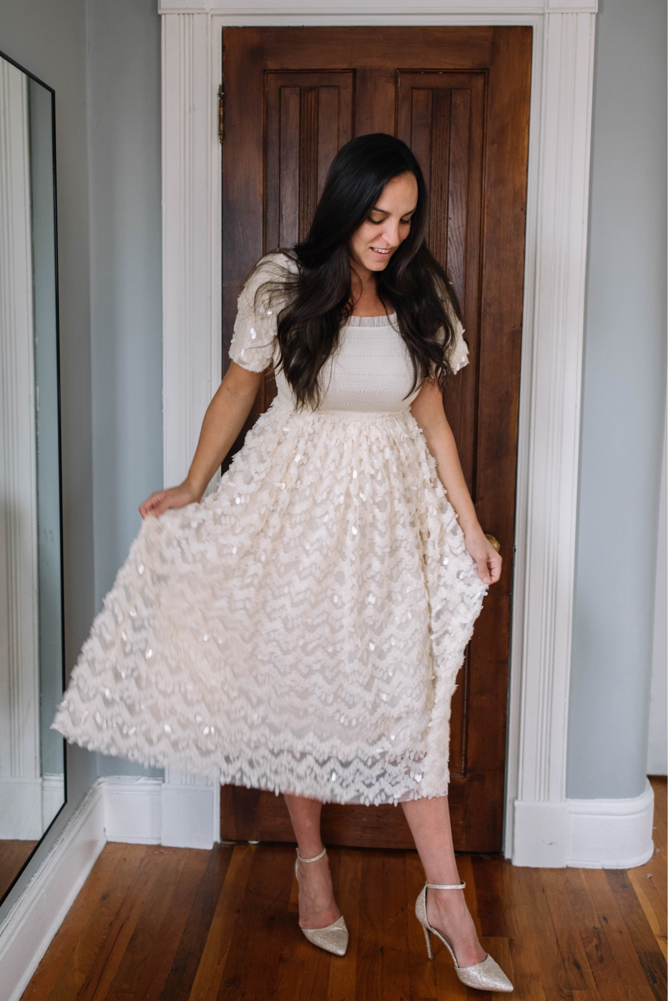 The Cloud 9 in Sparkle dress from
Ivy City Co! I got my TTS small but because it is smocked, you can size down!