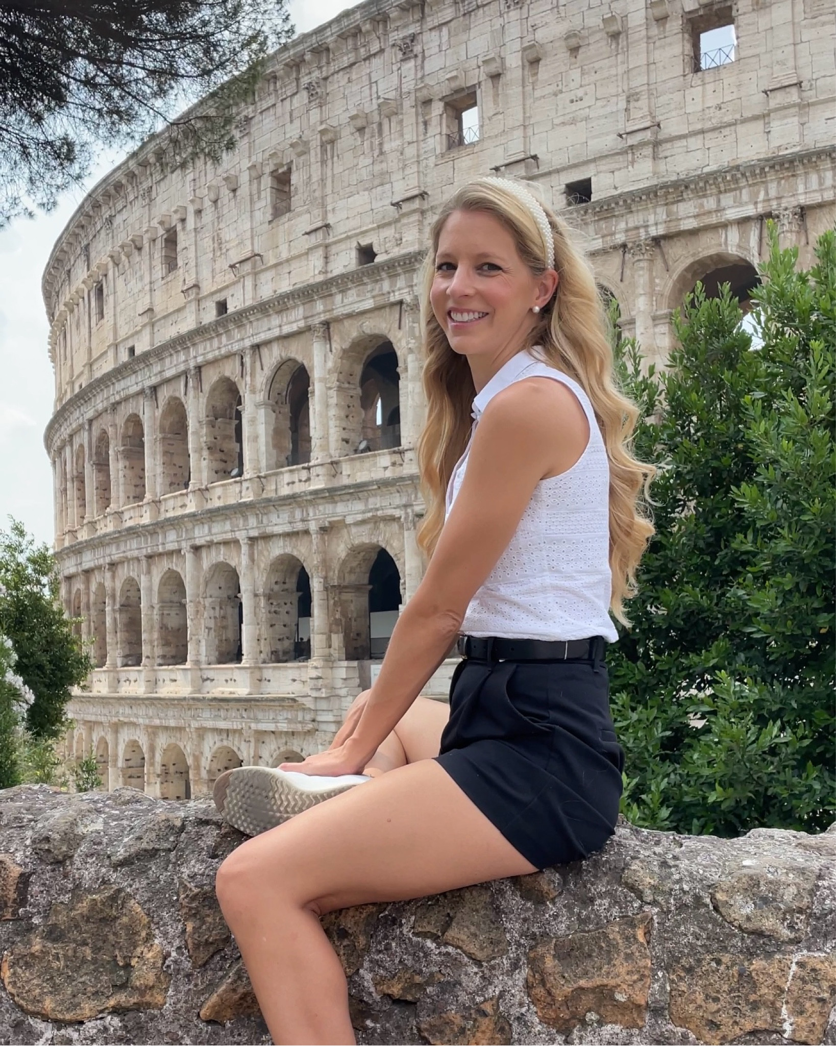 The most comfortable and chic shorts for all your summer travels

Can be dressed down for exploring during the day with sneakers and a tee or dressed up with a nice tank or blouse and a block heel for dinner.

These Cole Haan tennis shoes are the BEST travel shoe. They’ve been on every single trip with me in the last 5 years including Europe where we walked 20,000+ steps a day. They are super comfy and go with everything!

Tailored shorts, white sleeveless shirt, Cole Haan sneakers, chic outfit, europe outfits, what to wear in Rome, summer abroad,
Abercrombie, classic style European style, vacation style, Italian summer, outfit ideas for Europe, travel outfit, white tennis shoes, travel shoes, pearl headband

#LTKShoeCrush #LTKStyleTip #LTKTravel