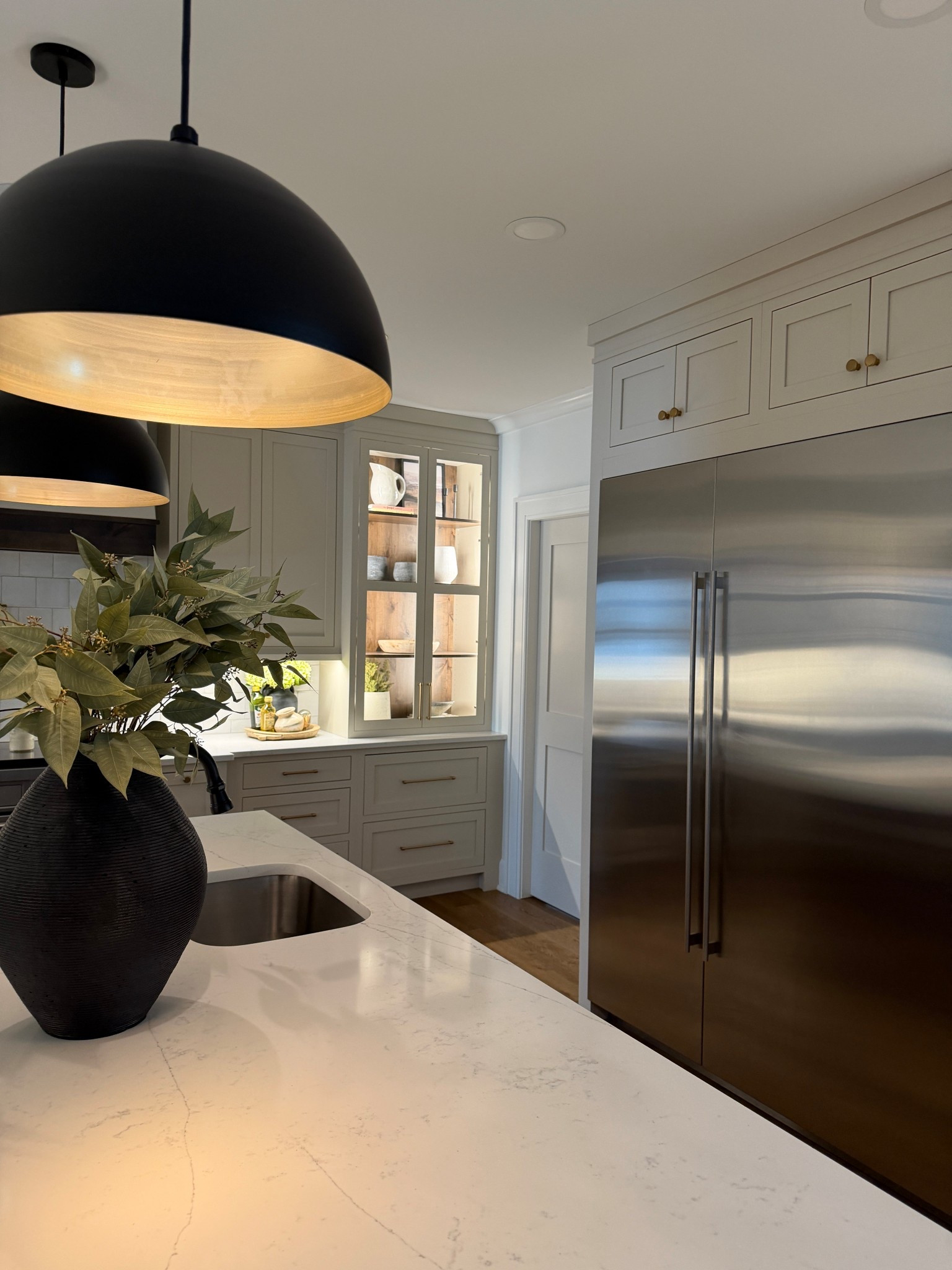 Kitchen views 

Cabinet color - Custom but very similar to Valspar Warm Putty 

#LTKHome #LTKSaleAlert