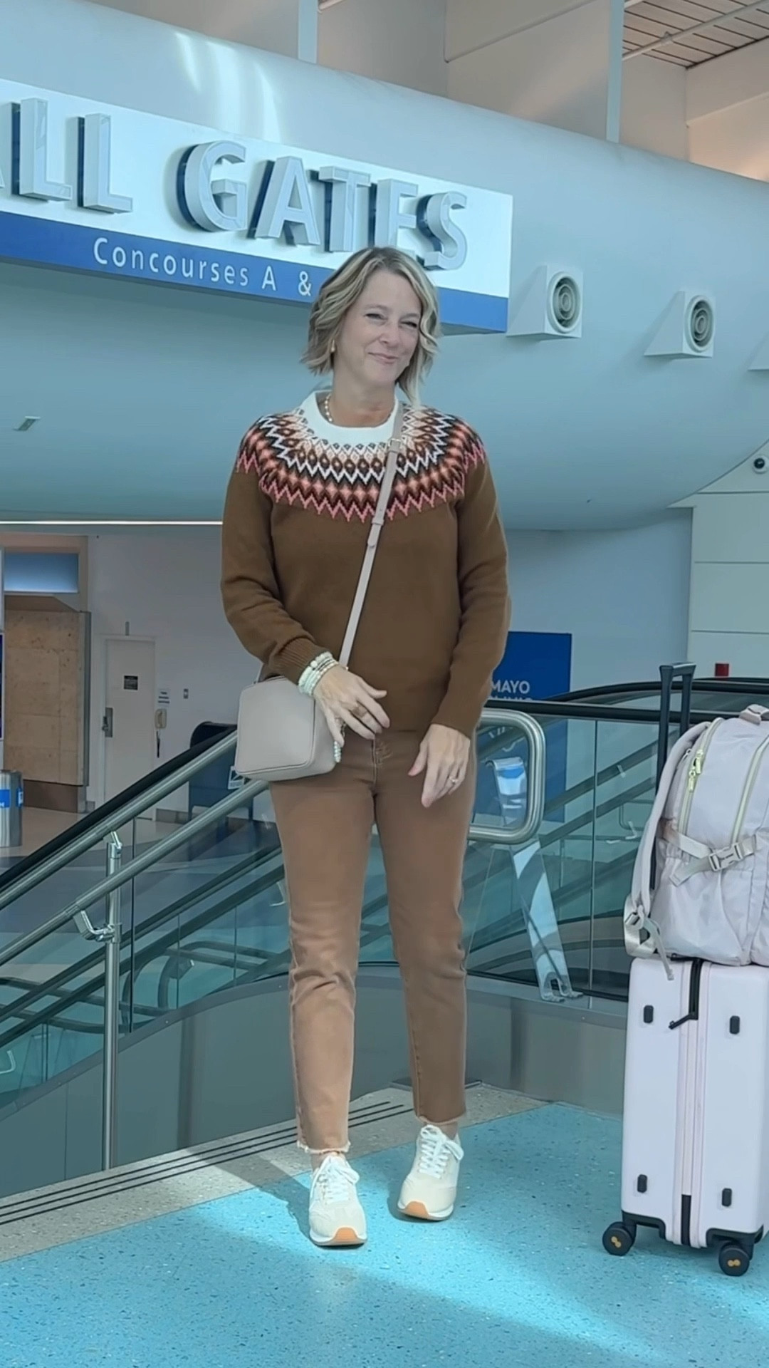 Fair Isle sweater for an airport outfit with your travel style. Size 10 wearing L. I’m 5’8” and over 50. The corduroy pants are like soft jeans tts. Love the neutral dearfoam sneakers. Over 40 fashion, style tip, style over 50

#LTKShoeCrush #LTKOver40 #LTKTravel