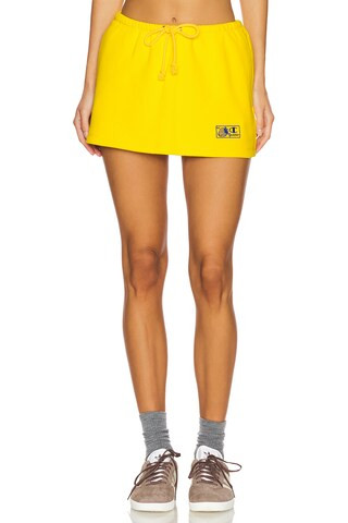 Champion X Guizio Micro Mini Skirt in Yellow Cab from Revolve.com | Revolve Clothing (Global)