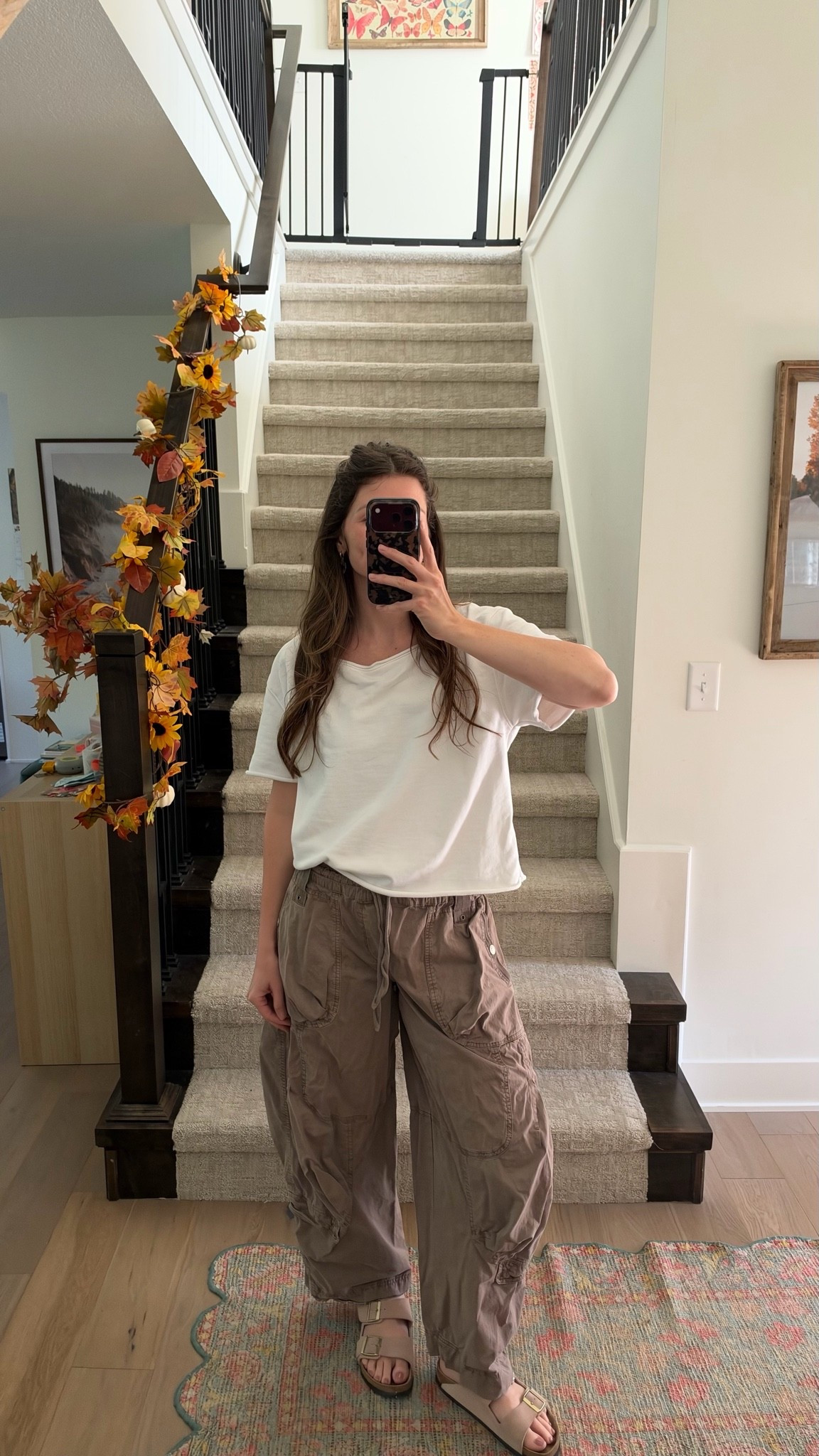 wearing medium in top (sized up) and small in cargos