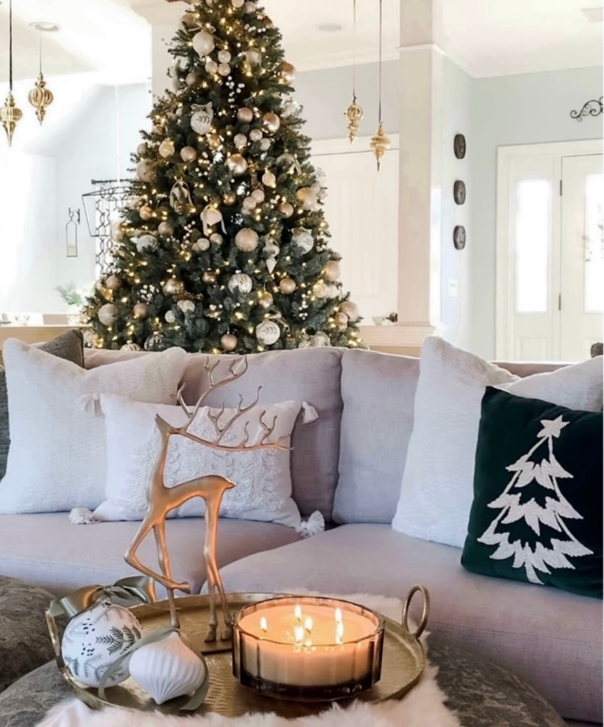 Early Christmas styling. Christmas tree, brass reindeer, cozy throw blankets and pillows, holiday candles, sofa, ornaments +more! Target, Amazon, Pottery Barn 

#LTKFindsUnder50 #LTKHome #LTKSaleAlert