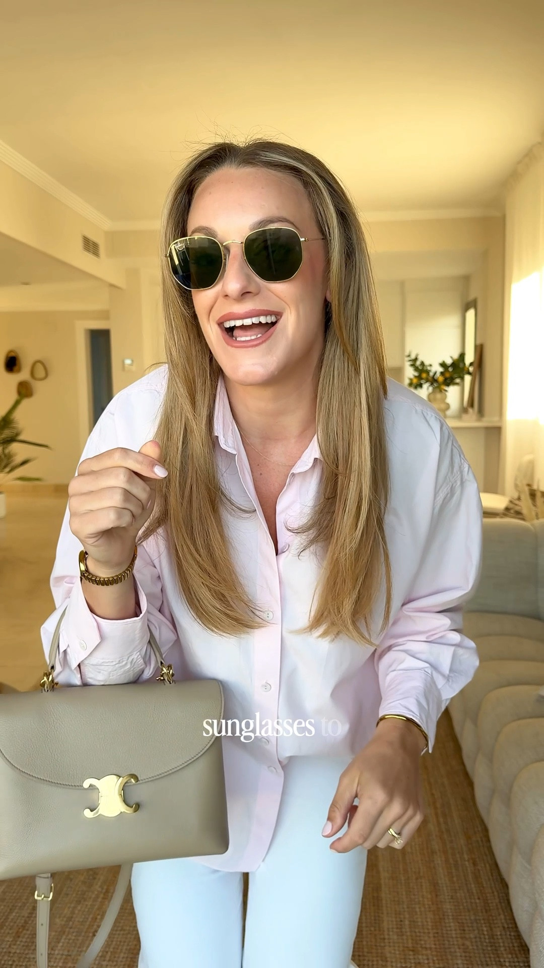 Spring outfit idea- midsize friendly - pink shirt, white straight leg jeans, suede ballet flats, celine bag , rayban sunglasses - shopping outfit spring 

#LTKuk #LTKspring #LTKeurope