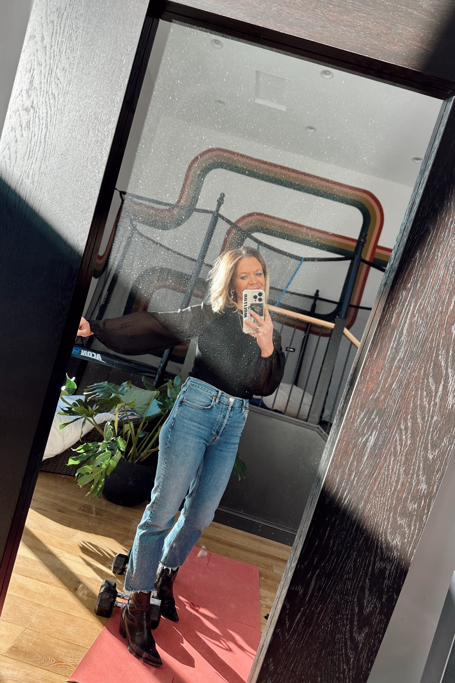 Business casual kind of day! Meetings during the day, happy hour after. Love this sleeve detailing. Cinched at the wrist. Fitted, ribbed and sheer sleeves. High neck. Favorite high waisted jeans. Rock these boots all the time! 

#LTKworkwear #LTKbeauty #LTKparties