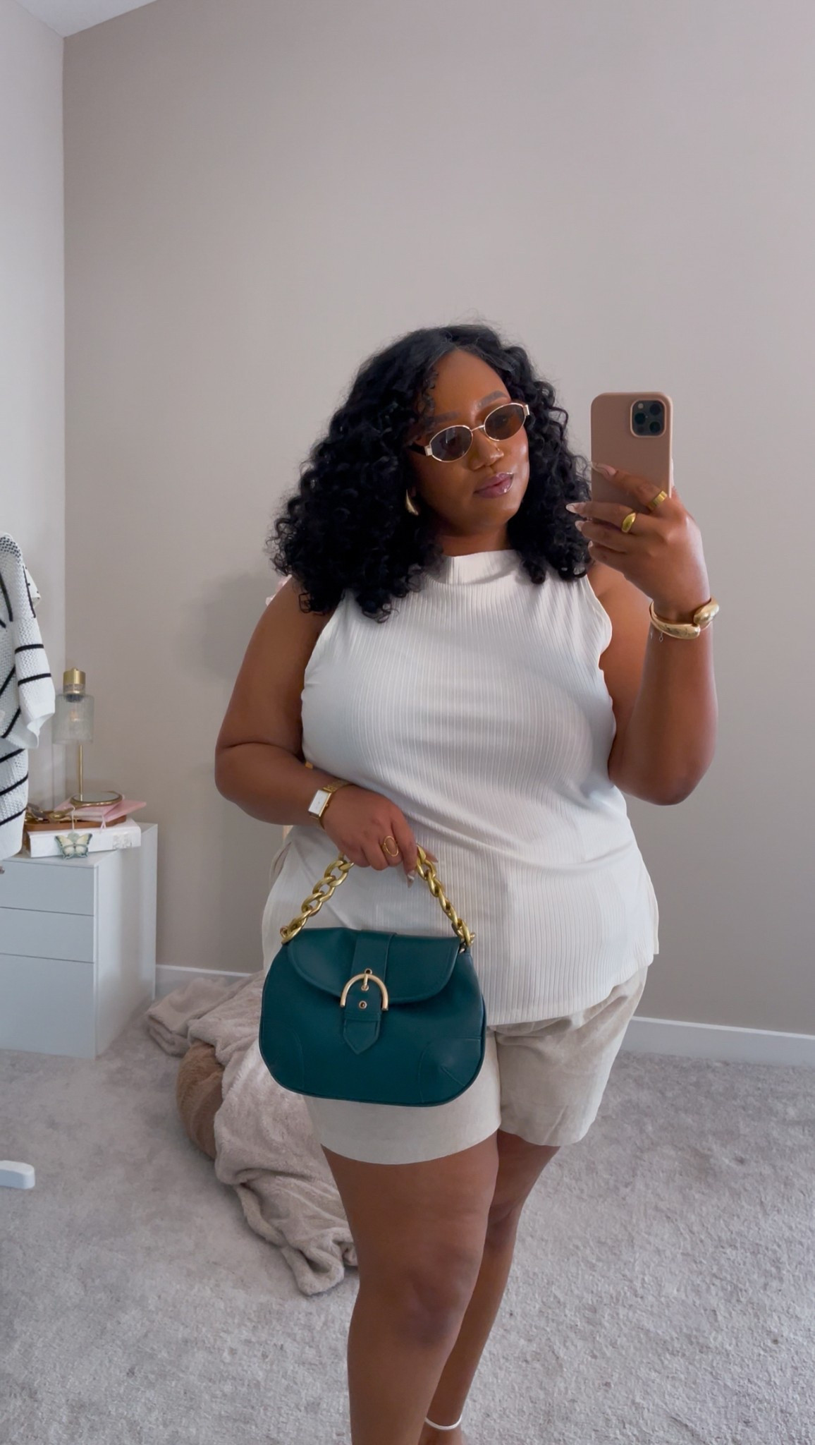 Started adding gold chains from Amazon to my purses to make them look more expensive. It takes this $19.99 bag up a notch 🤌🏾💚

#LTKStyleTip #LTKPlusSize