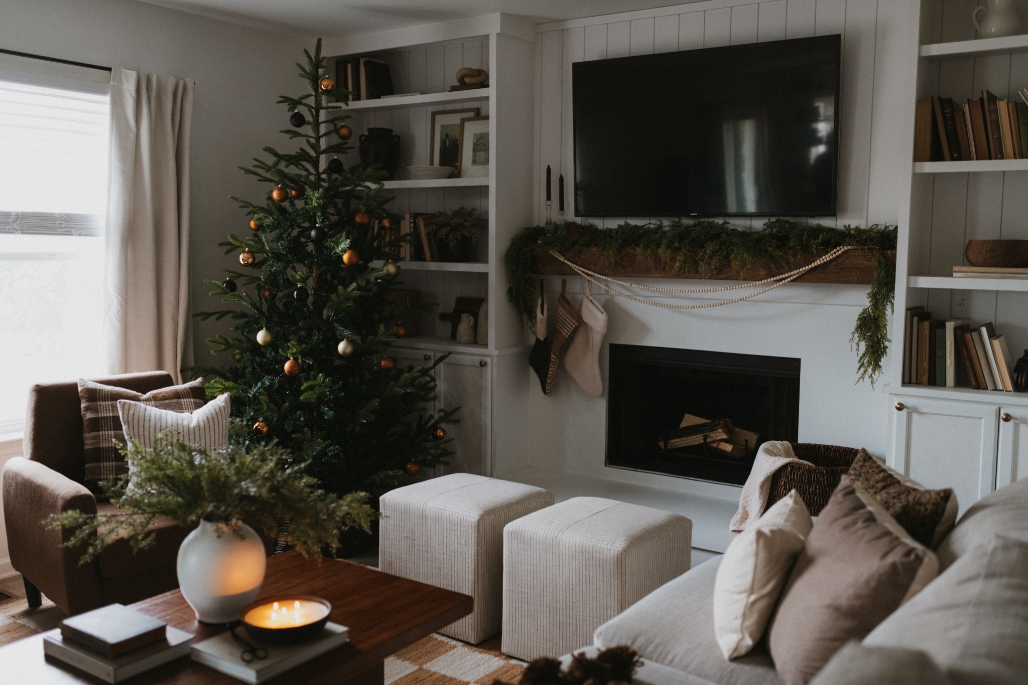 Christmas living room, Christmas decor, neutral living room decor, neutral Christmas decor, ottomans, holiday coffee table decor, Christmas tree inspo, Christmas tree ornaments, checkered rug, living room rug, area rug, Christmas garland, Christmas mantle decor

#LTKSeasonal #LTKHome #LTKHoliday