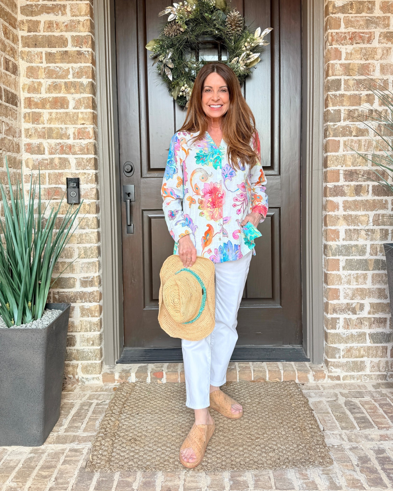 Soft gauze floral long sleeve top. Wear it buttoned up or as a topper. I’m wearing with white pull on jeans, a white ribbed tank, cork slides and a fun straw hat with a turquoise band. The finishing touch is the silver earrings with blue stones.

Everything runs true to size. All of my clothes are petite xs. Shoes are size 7 (I usually wear size 6 1/2-7).

These styles are available in misses, petites and women’s sizes. Perfect spring style for a day out shopping, brunch or a pool party. I could add a few pieces of jewelry and a pair of block herls for a dressier look.

#LTKOver40 #LTKPetite #LTKgrwm