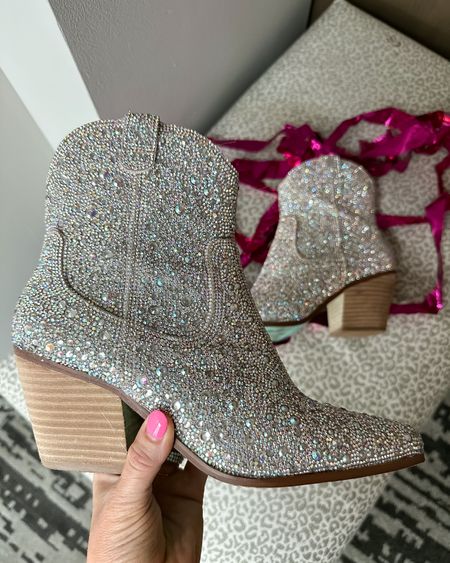 Buy the damn boots! I got so many compliments on them last night at the Carrie Underwood concert. I will say after 7ths of wearing them and walking blocks and standing my feet did hurt a little bit but they were worth it. So gorgeous and sparkly. I can’t wait to wear them again.


#LTKshoecrush #LTKFind #LTKFestival