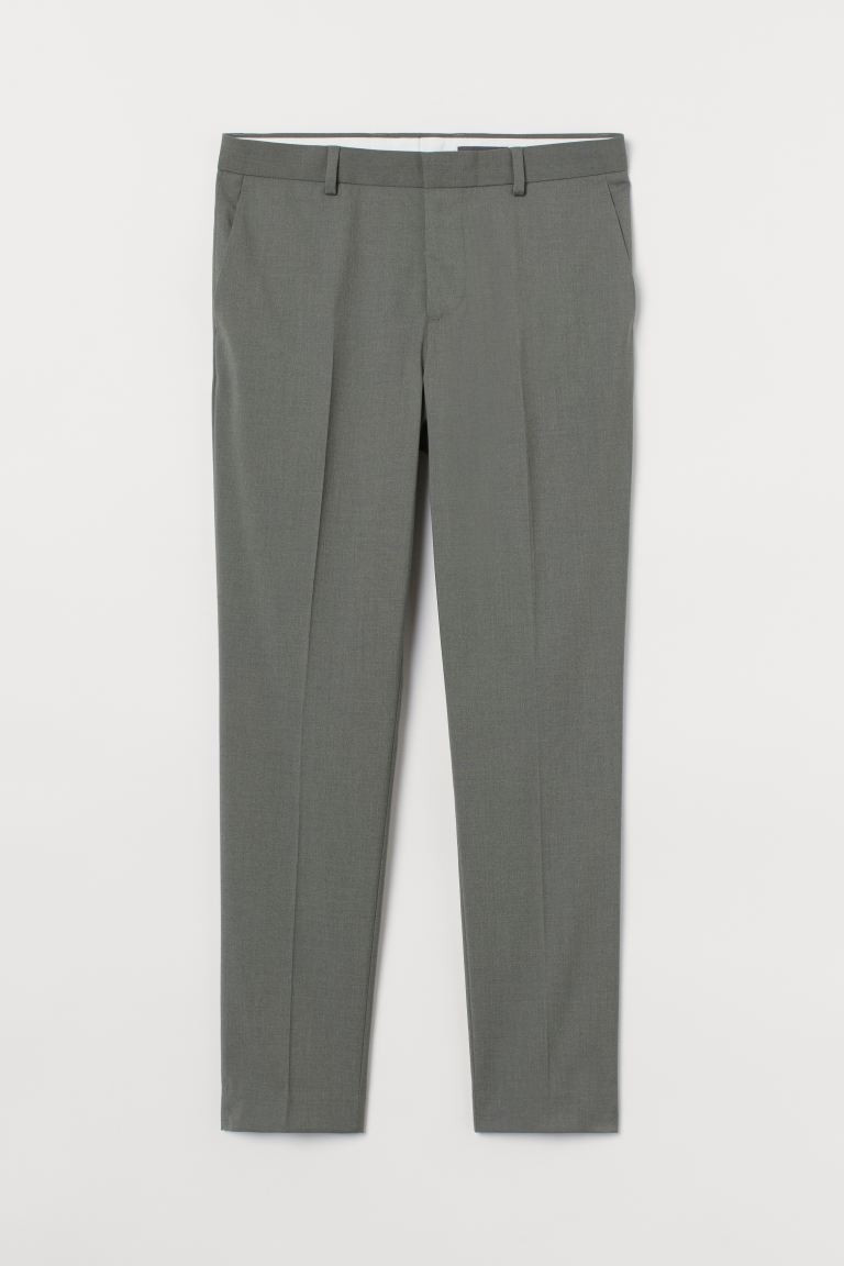 Suit pants in woven fabric with concealed zip fly and hook-and-eye fastener. Side pockets, welt b... | H&M (US + CA)