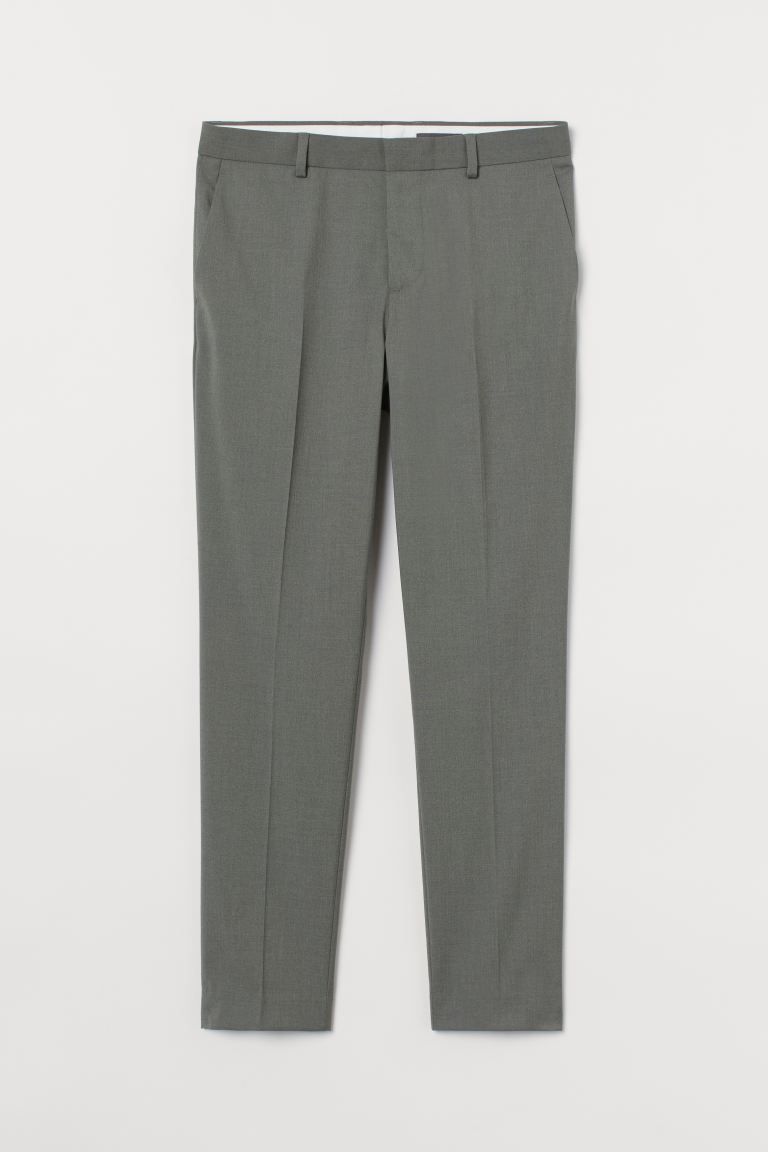 Suit pants in woven fabric with concealed zip fly and hook-and-eye fastener. Side pockets, welt b... | H&M (US + CA)