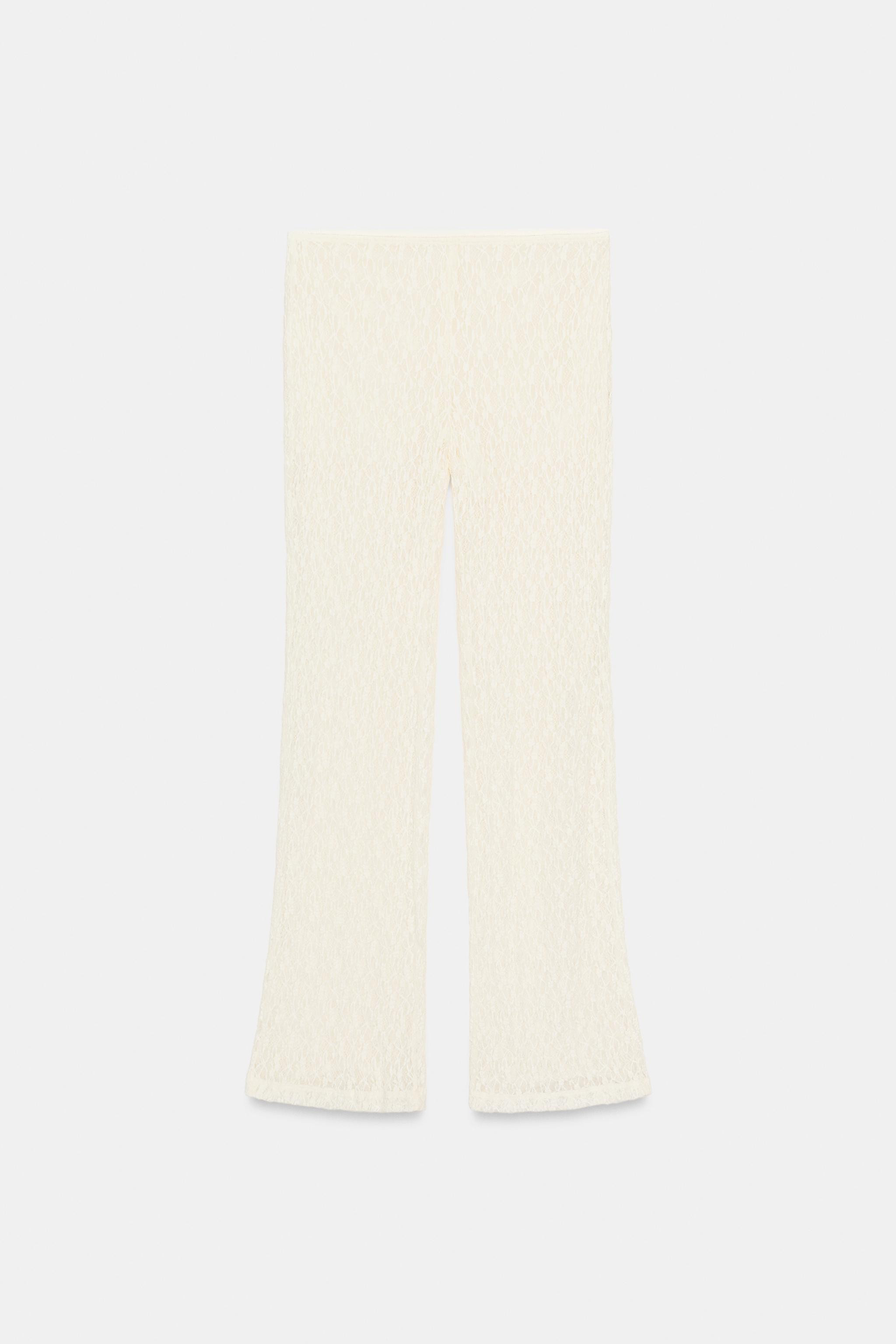 Mid-waist trousers with an elasticated waistband. Featuring a matching inner shorts lining. | Zara UK