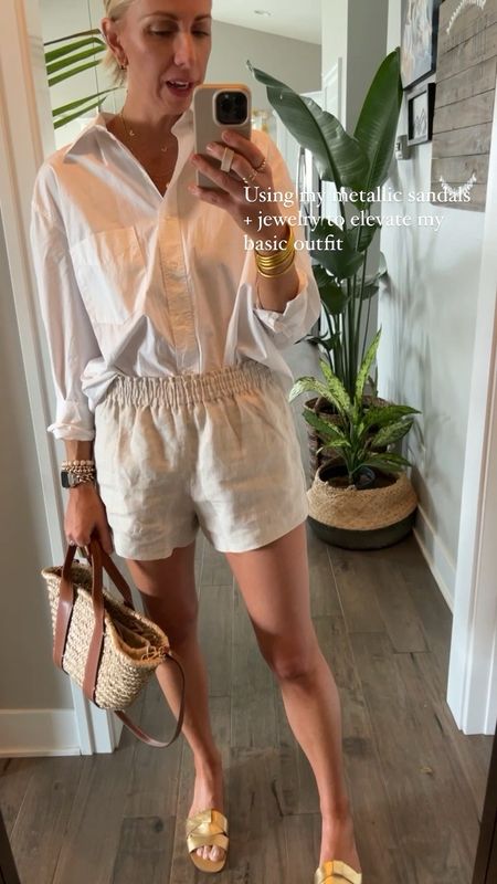 How to wear an oversized white shirt, paired with linen shorts + metallic sandals 
wearing a size medium in the shorts for a more relaxed it size up one 

#LTKstyletip #LTKFind #LTKSeasonal