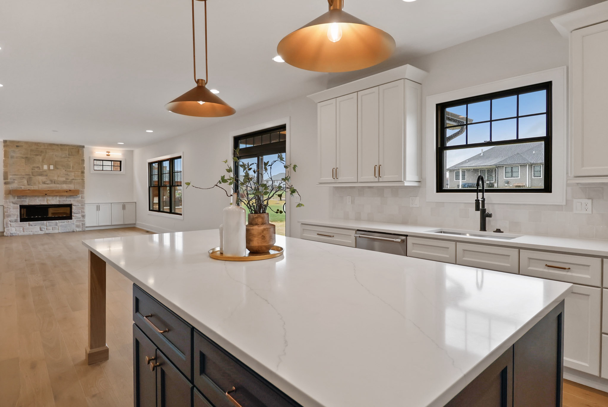 Kitchen- Island, white cabinets, black faucet 

#LTKHome