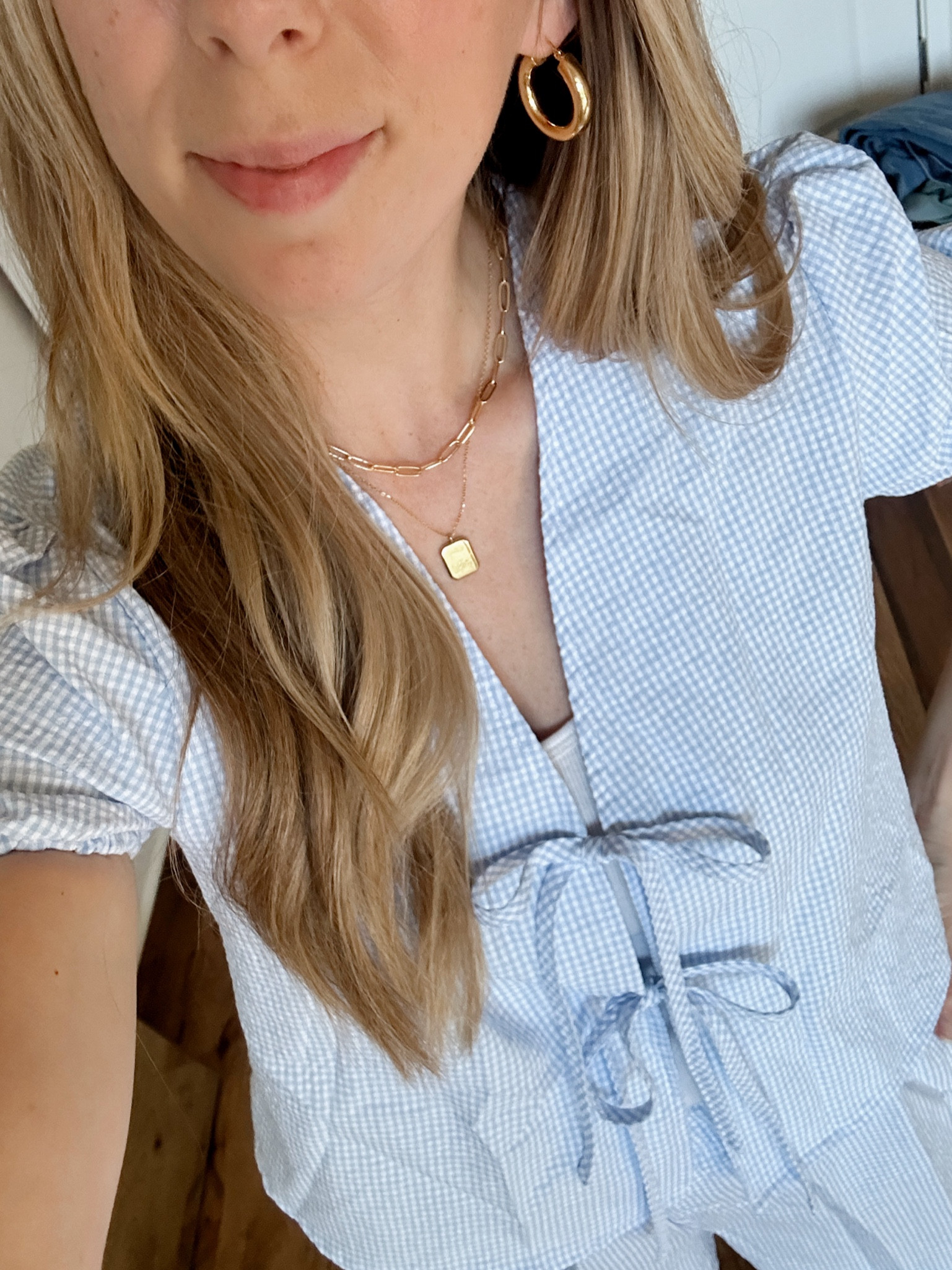 Gingham bow tie front top and shorts set by BarbiGia. Amazon summer set find. Blue and white outfit. 


#LTKSeasonal #LTKMidsize #LTKFindsUnder50