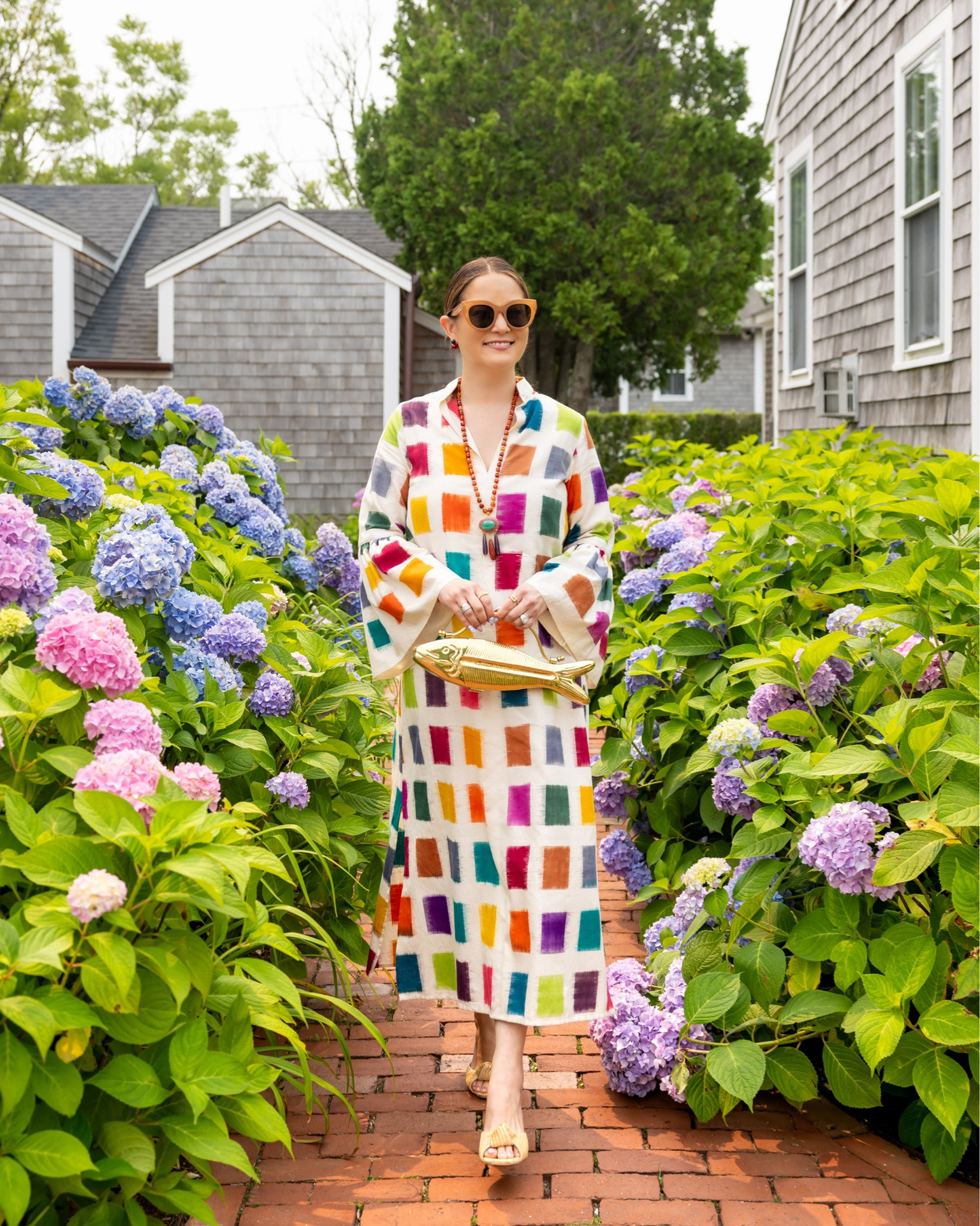 Summer hydrangea always put a smile on my face! This multicolor de Castro caftan, gold fish bag by The Vin Store, raffia heels by Tuckernuck, and statement jewelry by Jennifer Behr x Julia Berolzheimer were perfect for a day on Nantucket.

#LTKSeasonal #LTKstorytime #LTKTravel