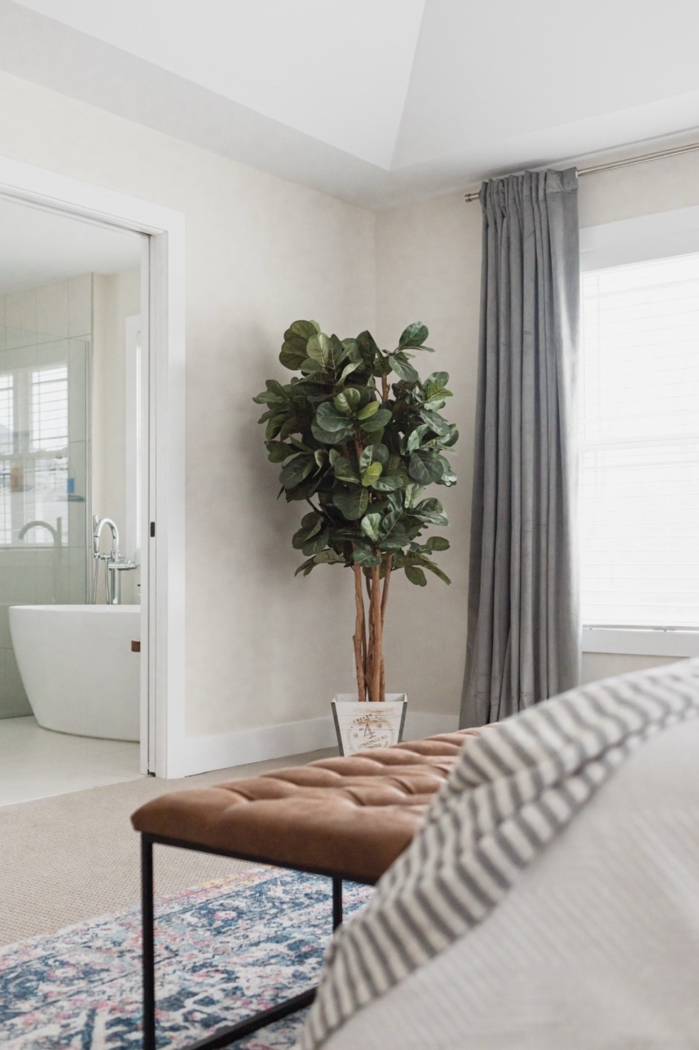 Two of my favorite Amazon home purchases: those gray velvet curtains that are room darkening! And 6 ft. tall fiddle leaf artificial tree. And both are still in stock. // bedroom inspo, faux leather bedroom bench, white duvet cover, affordable area rug.

#LTKSaleAlert #LTKStyleTip #LTKHome
