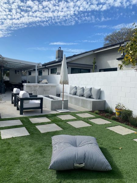 Love my backyard so much 🥲💙 The floor pillow is THE BEST!

#LTKhome