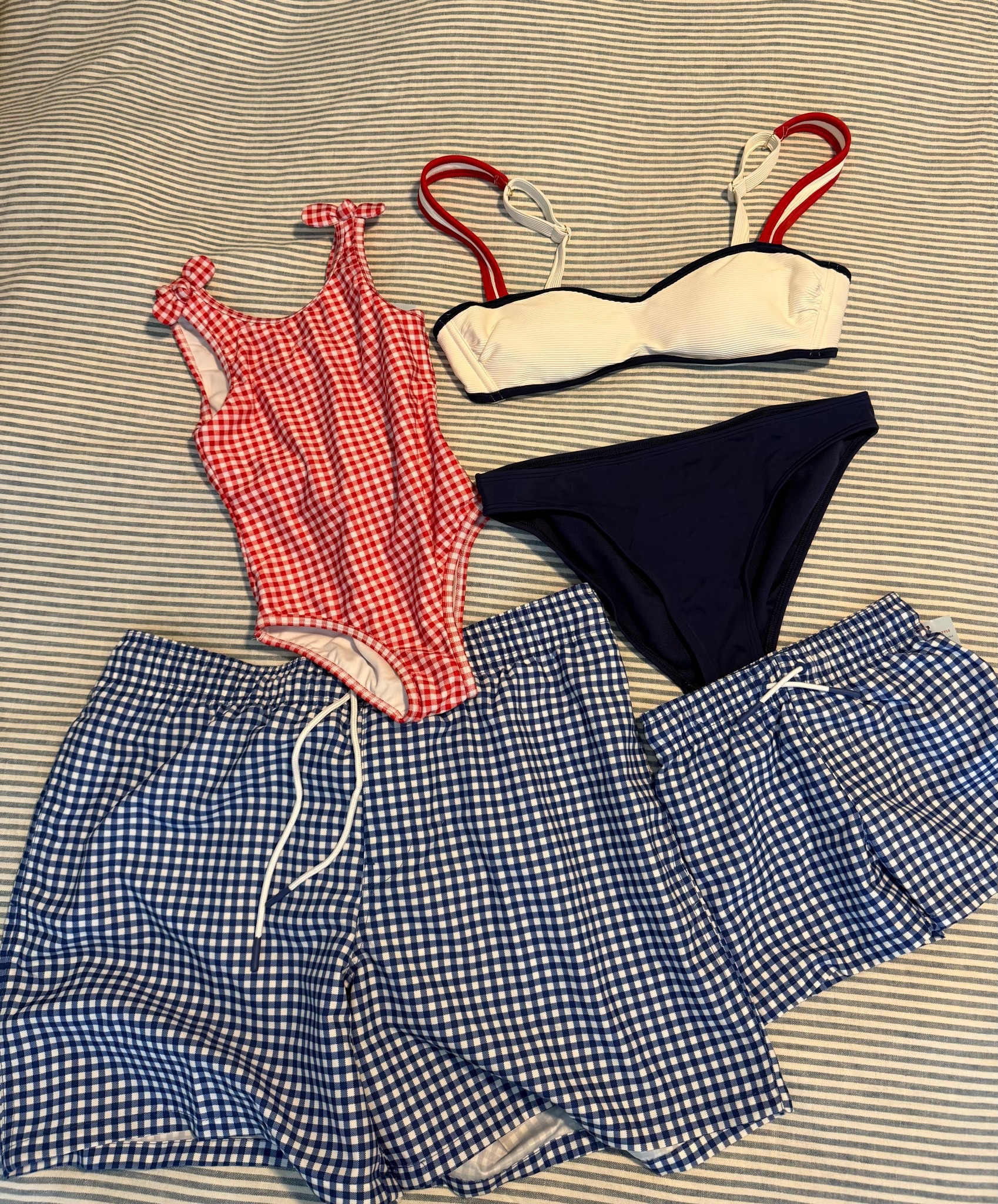 Red, White & CUTE 🇺🇸 Matching Family Swim Picks

Whether you're poolside or beach-bound this summer, this red, white, and blue swimwear is giving all the festive 4th of July vibes ❤️💙🤍 From gingham checks to classic navy, this coordinating family swim set is a must-have for those memory-making days in the sun!

👧 Toddler/Youth Girl: Red gingham one-piece with bow shoulder straps
👙 Mom: Ribbed white bikini top with contrast straps + navy bottoms
👦 Dad & Son: Matching blue gingham swim trunks (elastic waistband + drawstring!)

🛍️ Perfect for:
• Memorial Day weekends
• 4th of July family trips
• Matching family beach photos
• Summer vacations

💡 Tip: Mix & match gingham with solids for an easy, cohesive look!

📲 Tap to shop and get summer-ready with these timeless Americana-inspired suits!

RedWhiteAndCute
#FourthOfJulyStyle
#MatchingFamilySwim
#FamilySwimwear
#AmericanaStyle
#GinghamGoals
#FourthOfJulyLooks
#PatrioticStyle



#LTKSummerStyle
#FamilyBeachDay
#MatchingFamilyLooks
#MomAndMeStyle
#DadAndSonStyle
#FourthOfJulyVibes
#RedWhiteAndBlueFits
#SummerMatchingMoments
#CoastalFamilyStyle
#BeachTripReady
#LTKFourthOfJuly
#AmericanaAesthetic
#PoolsidePerfection
#HolidayWeekendStyle
#GinghamSeason
#SwimStyle2025
#MemoryMakingStyle

#LTKSwim #LTKFamily #LTKKids #LTKSummerEdit #LTKFamily #LTKSeasonal