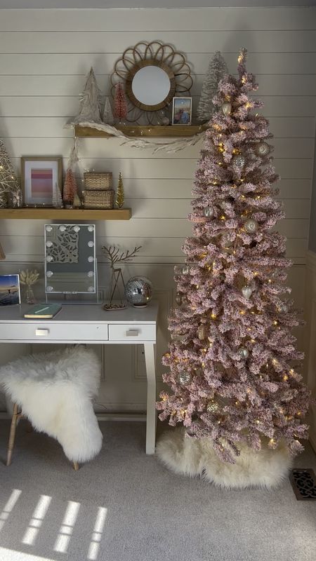 Love the flocked pink tree from At Home! Decorated with mercury glass ornaments for our daughters Christmas bedroom!

Teen girl room, Christmas tree, flocked tree, rose gold Christmas tree, pink Christmas tree, coastal bedroom decor, girl bedroom decor, Hollywood vanity mirror, disco ball, mirror ball decor, fun holiday decor, girl bedroom, white desk, floating shelves, faux fur area rug, fluffy sheepskin faux fur accent rug, wicker lamp, Studio McGee rattan table lamp.

#christmas #holidaydecor
#bedroom

#LTKHoliday #LTKhome #LTKSeasonal