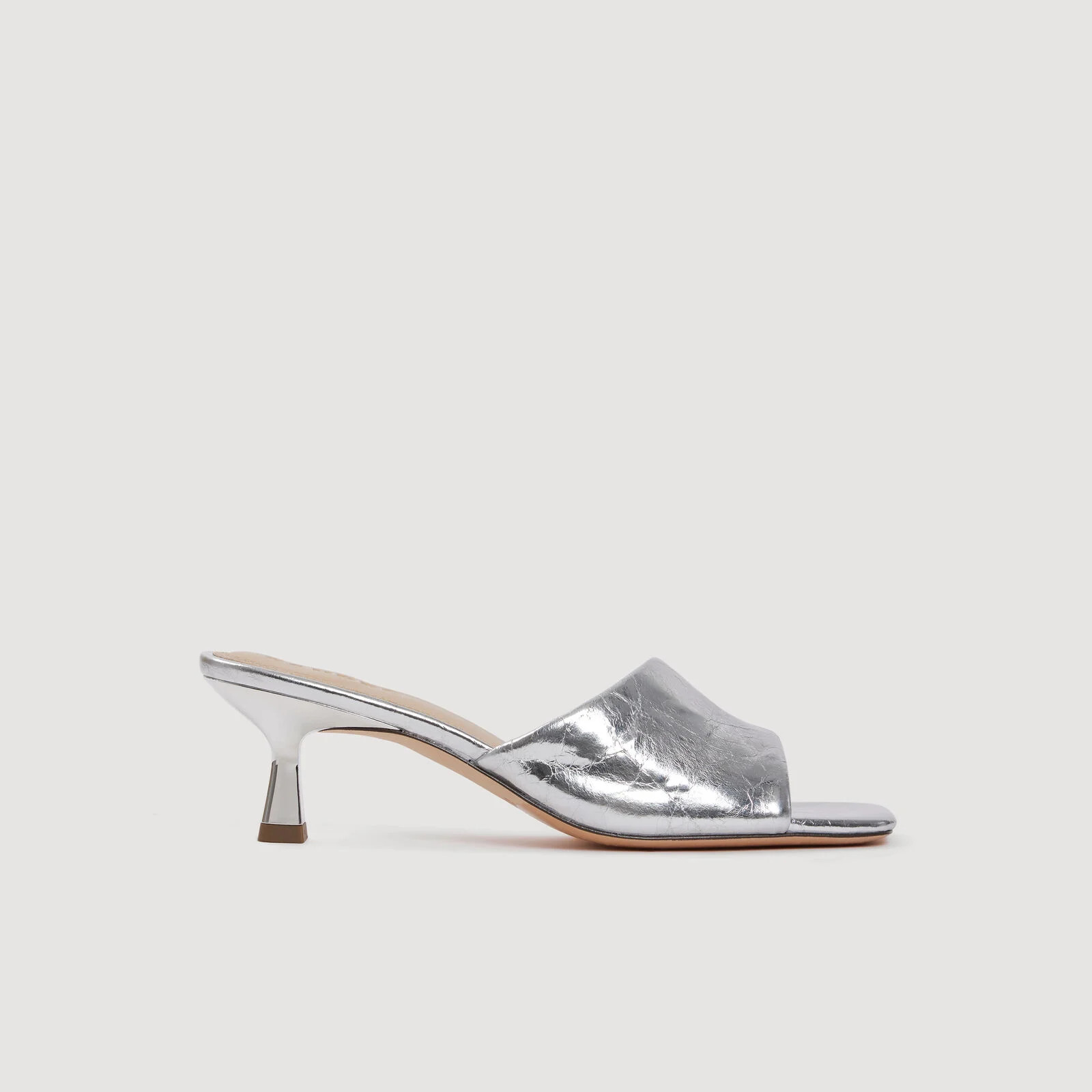 Heeled metallic leather mules | Sandro US | Sandro-Paris US