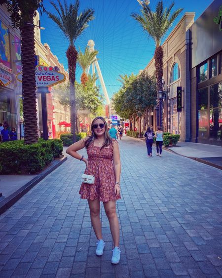 Took my favorite smocked mini dress to Vegas! But make it comfy with white sneakers. Everything true to size!

#LTKtravel #LTKstyletip #LTKunder100
