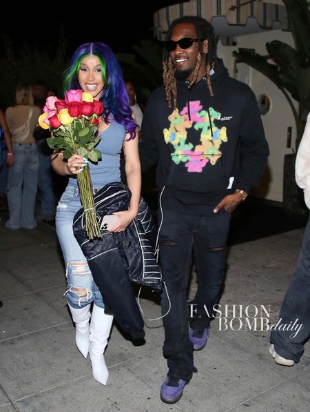 @iamcardib and @offsetyrn hit the town, with #cardib in a simple blue tank, jeans, and white boots, and #offset in a $499 @miharayasuhiro_official graphic-print cotton hoodie. 

#LTKFind #LTKBacktoSchool #LTKSeasonal