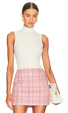 SPANX Suit Yourself Ribbed Mockneck Bodysuit in Powder from Revolve.com | Revolve Clothing (Global)