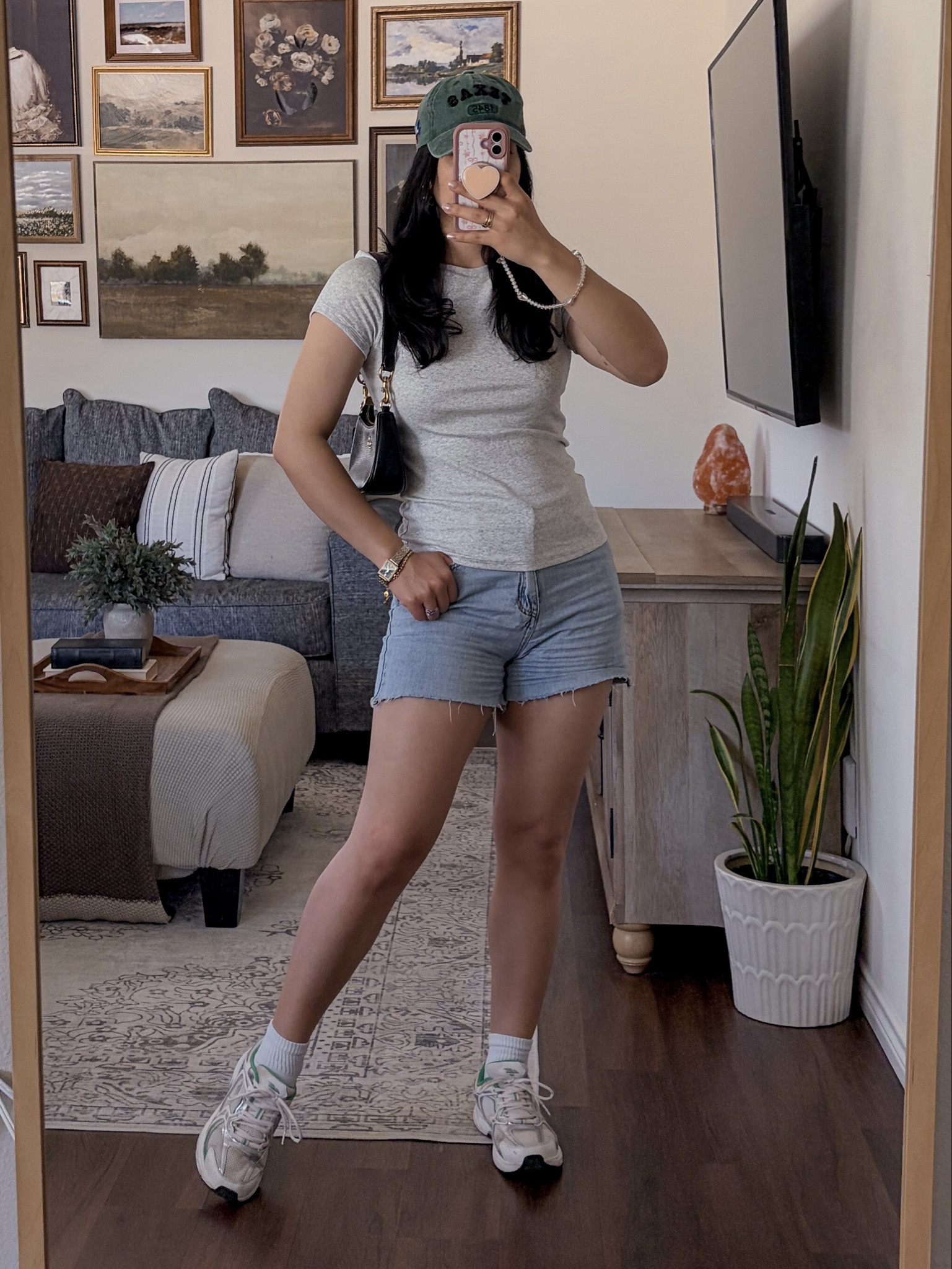 today’s fit 🍃 grey ribbed tshirt outfit, fitted tee outfit, denim shorts outfit, baseball cap outfit, dad sneakers outfit, casual streetwear outfit, everyday casual outfit, summer casual outfit, athleisure outfit, sporty chic outfit, off duty model style, effortless street style, casual cool outfit, minimal street style, neutral outfit inspo, grey outfit aesthetic, laid back style, weekend outfit idea, running errands outfit, comfy cute outfit, sporty casual look, streetwear basics, elevated basics outfit, coach shoulder bag outfit, Coach bag outfit, BaubleBar jewelry outfit, gold jewelry styling, layered jewelry look, accessories inspo, baseball hat outfit, sneakers outfit inspo, dad shoe trend, ootd, outfit inspo, style inspo, fashion inspo 2026, trending outfits, everyday style  

 #LTKFestival #LTKgrwm #LTKootd