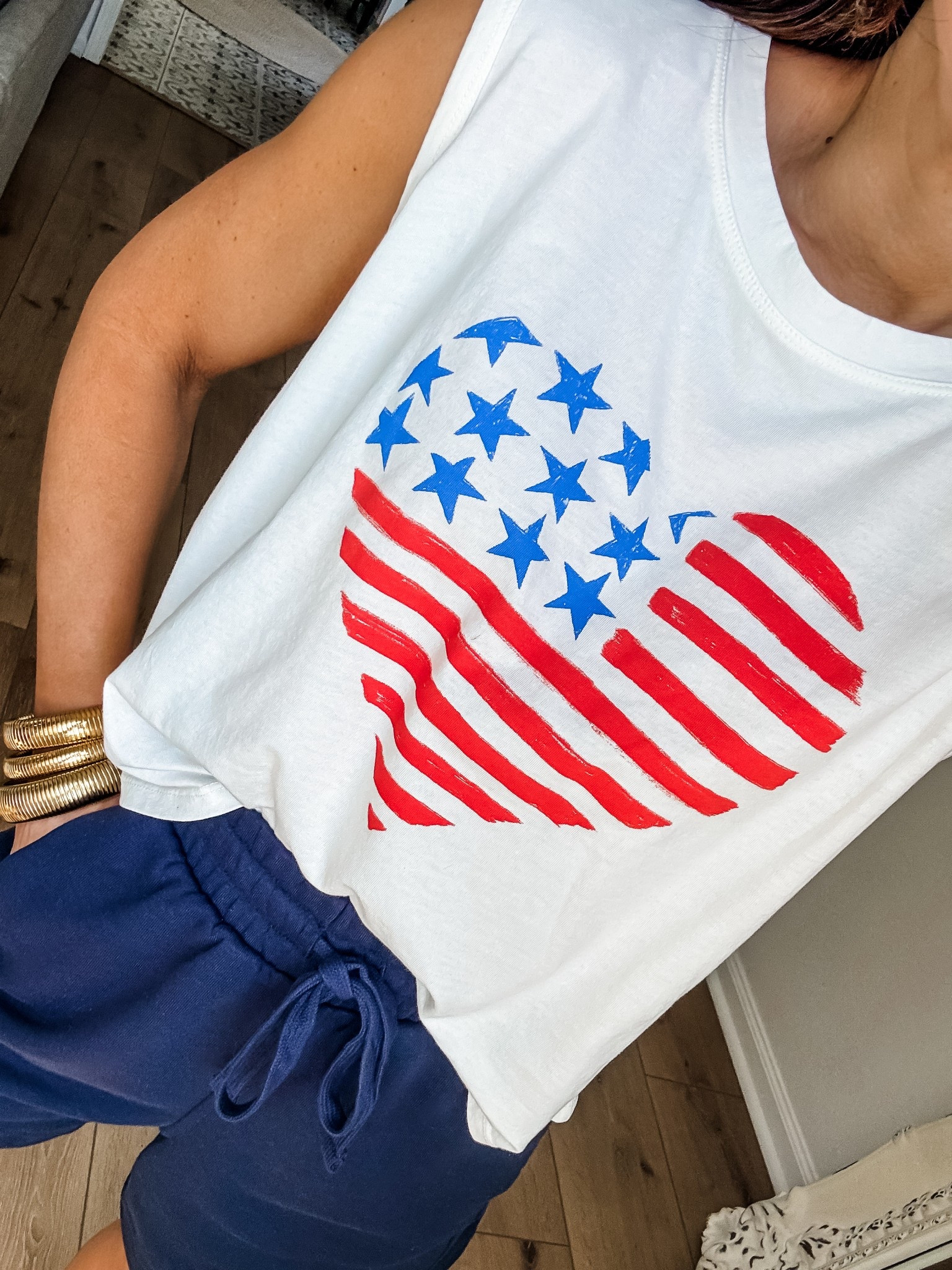 Code Tammy10. Small graphic tank top. Small shorts. MDW outfit, Americana, 4th of July outfit 

#LTKOver40 #LTKFindsUnder50 #LTKSaleAlert