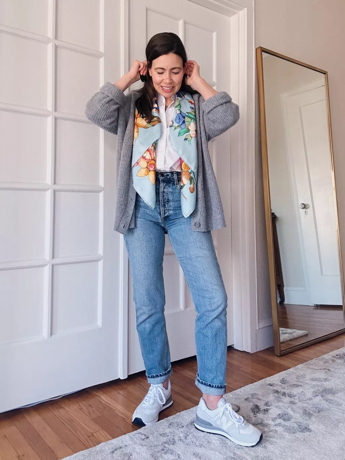 gray coat with mint scarf and Levi's straight leg cropped jeans