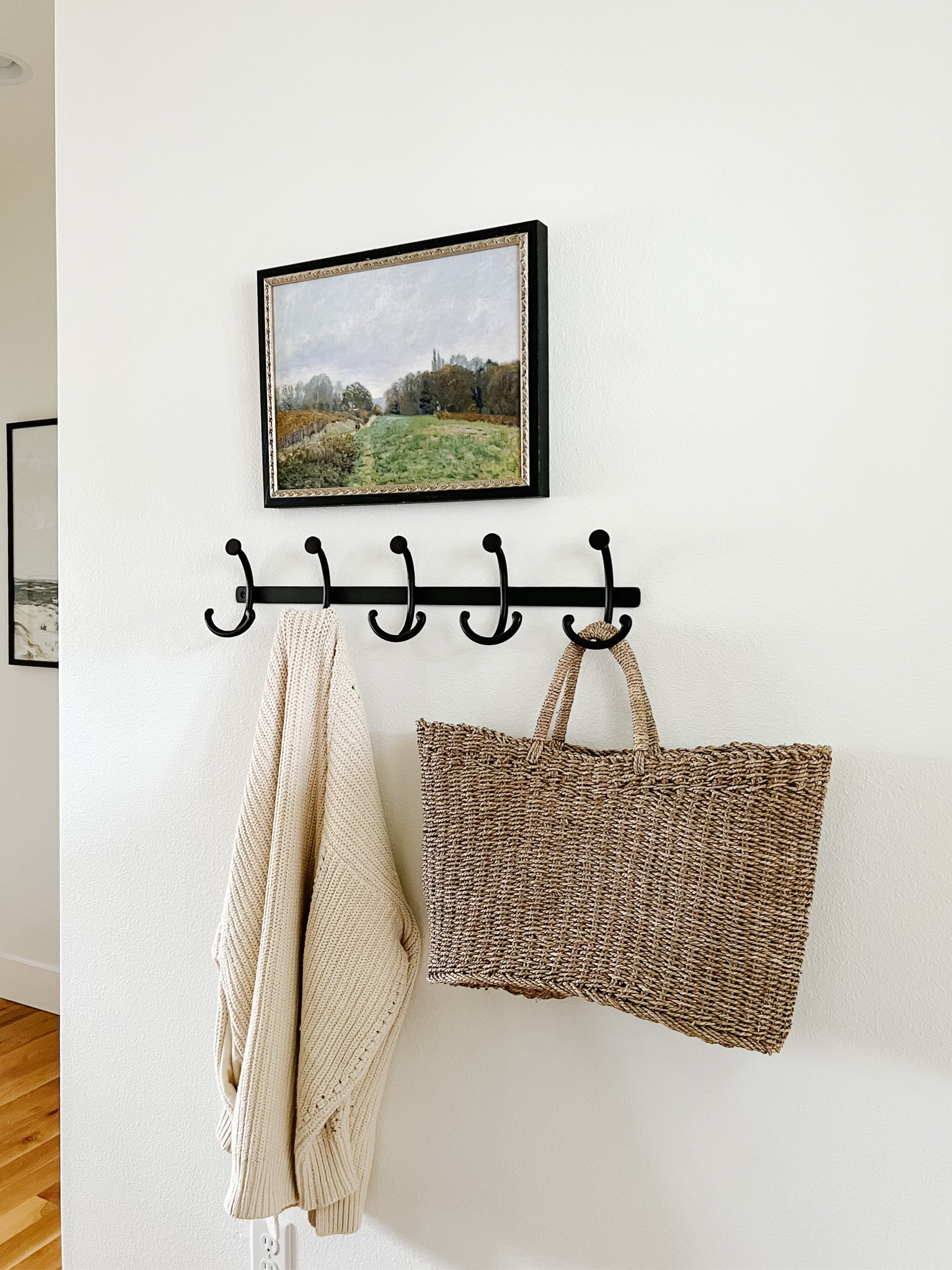 A simple entryway wall decor idea - coat hook with a pretty piece of artwork above it. 

Home decor 


#LTKstyletip #LTKFind #LTKhome
